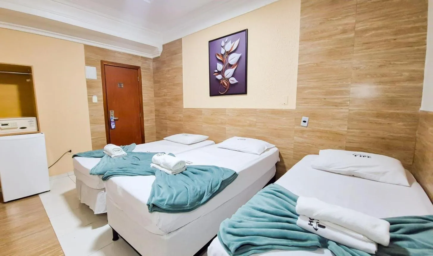 Bed in Hotel Ipê