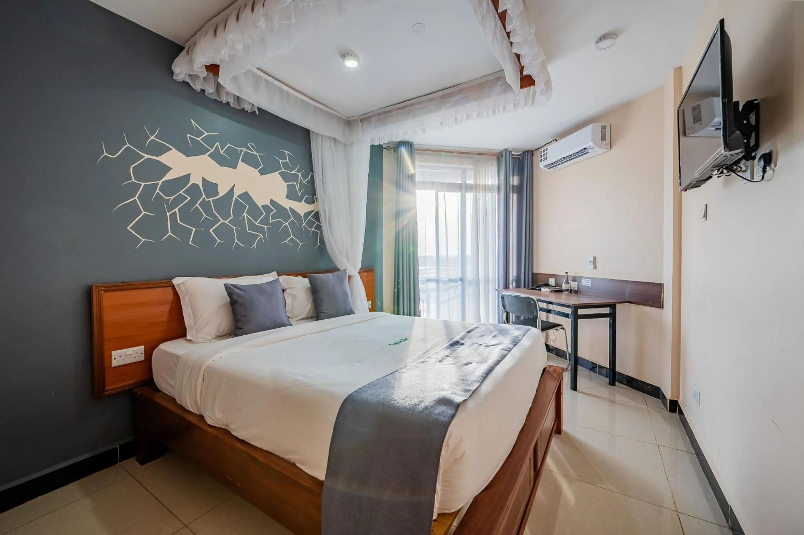 Bed in Divine Homes Resort Kisumu