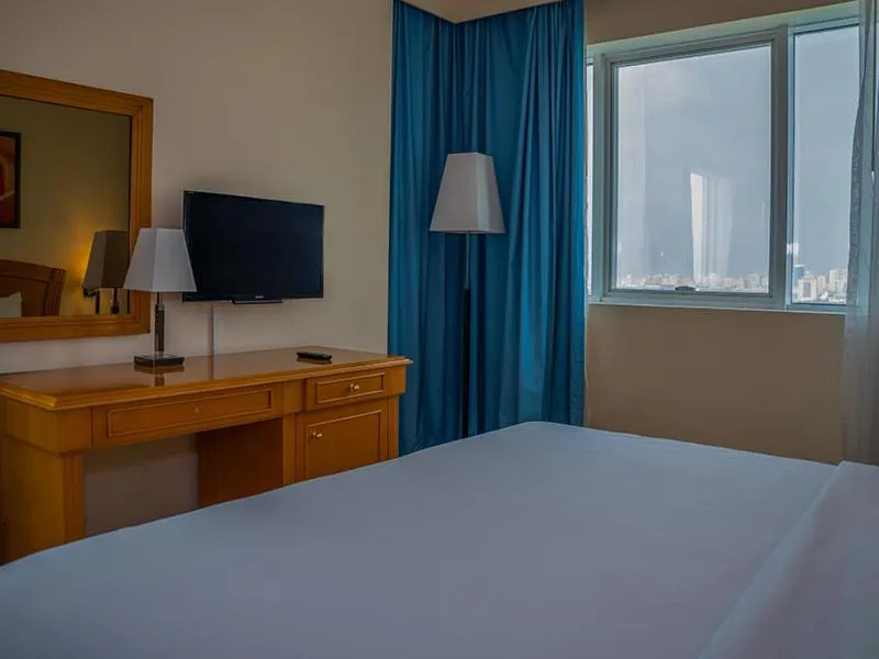 Bed in Golden Tulip Sharjah