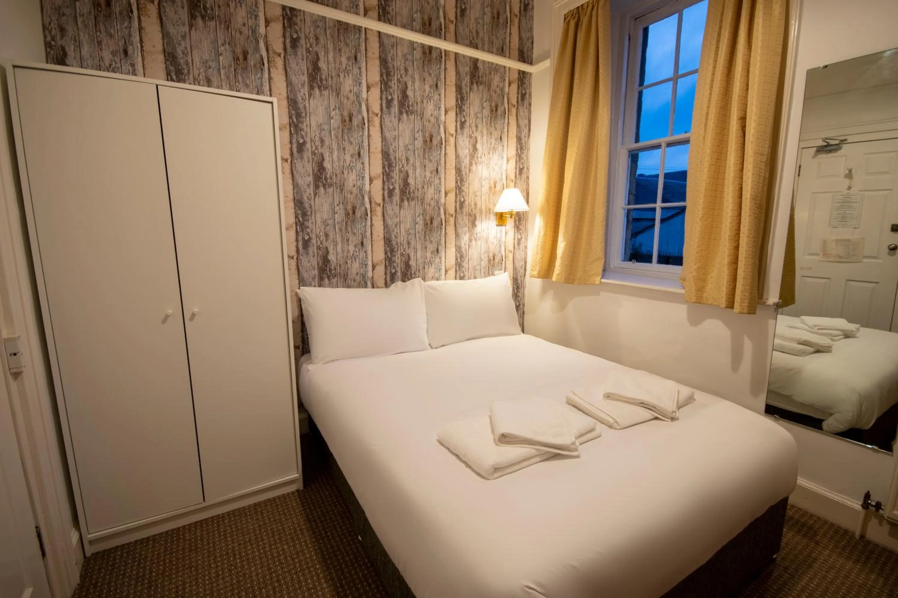 Bed in Douglas Arms Hotel