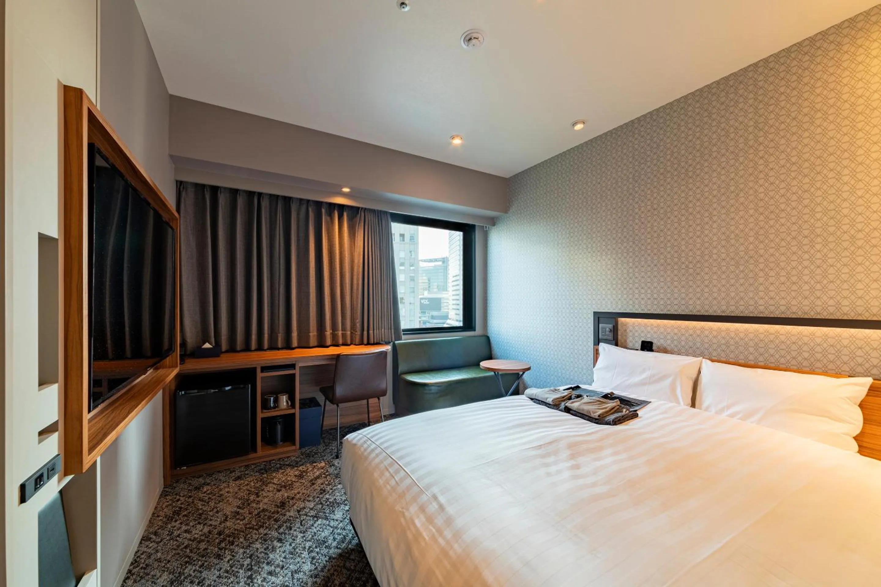 Bed in Via Inn Prime Osaka Kyobashi