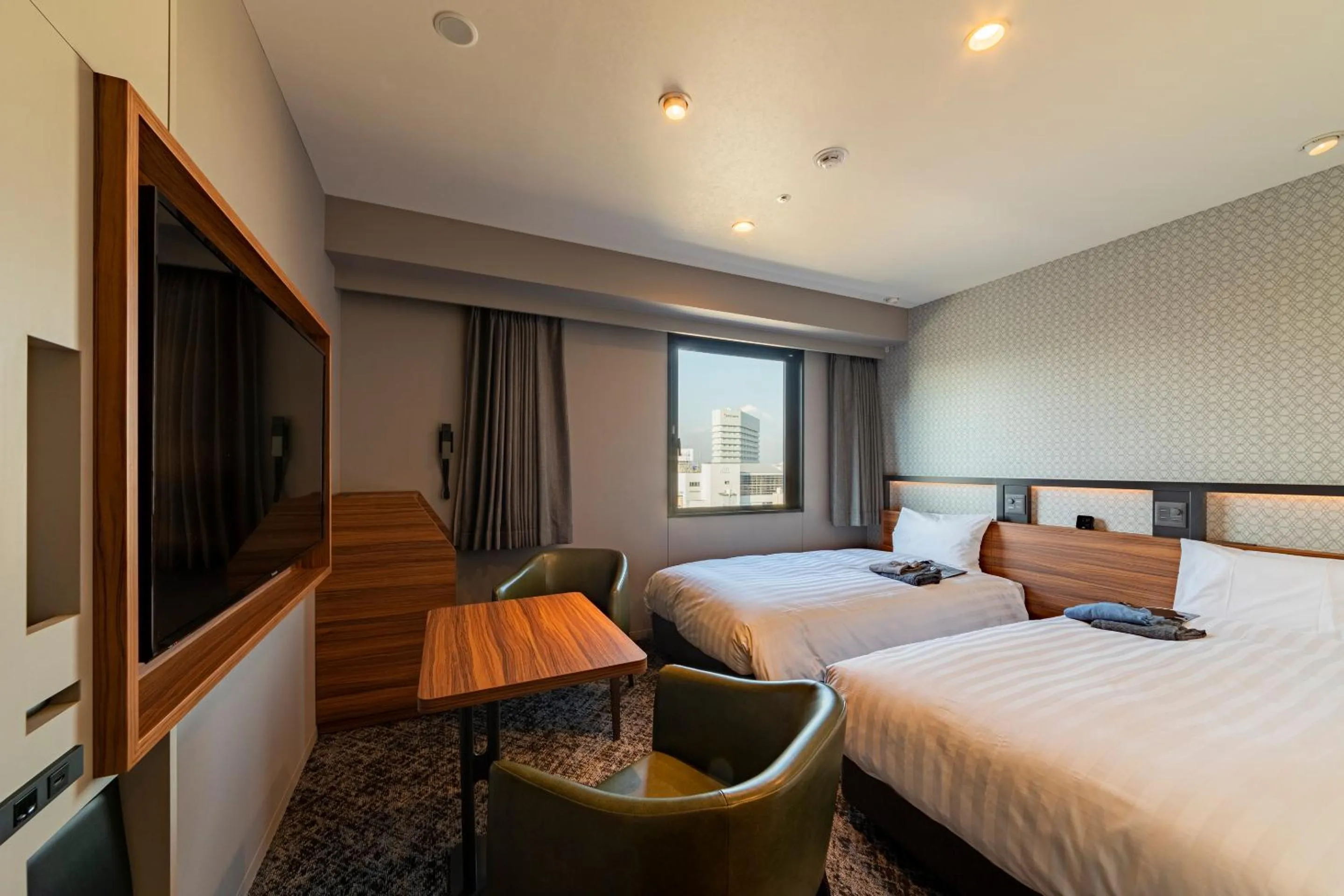 Bed in Via Inn Prime Osaka Kyobashi