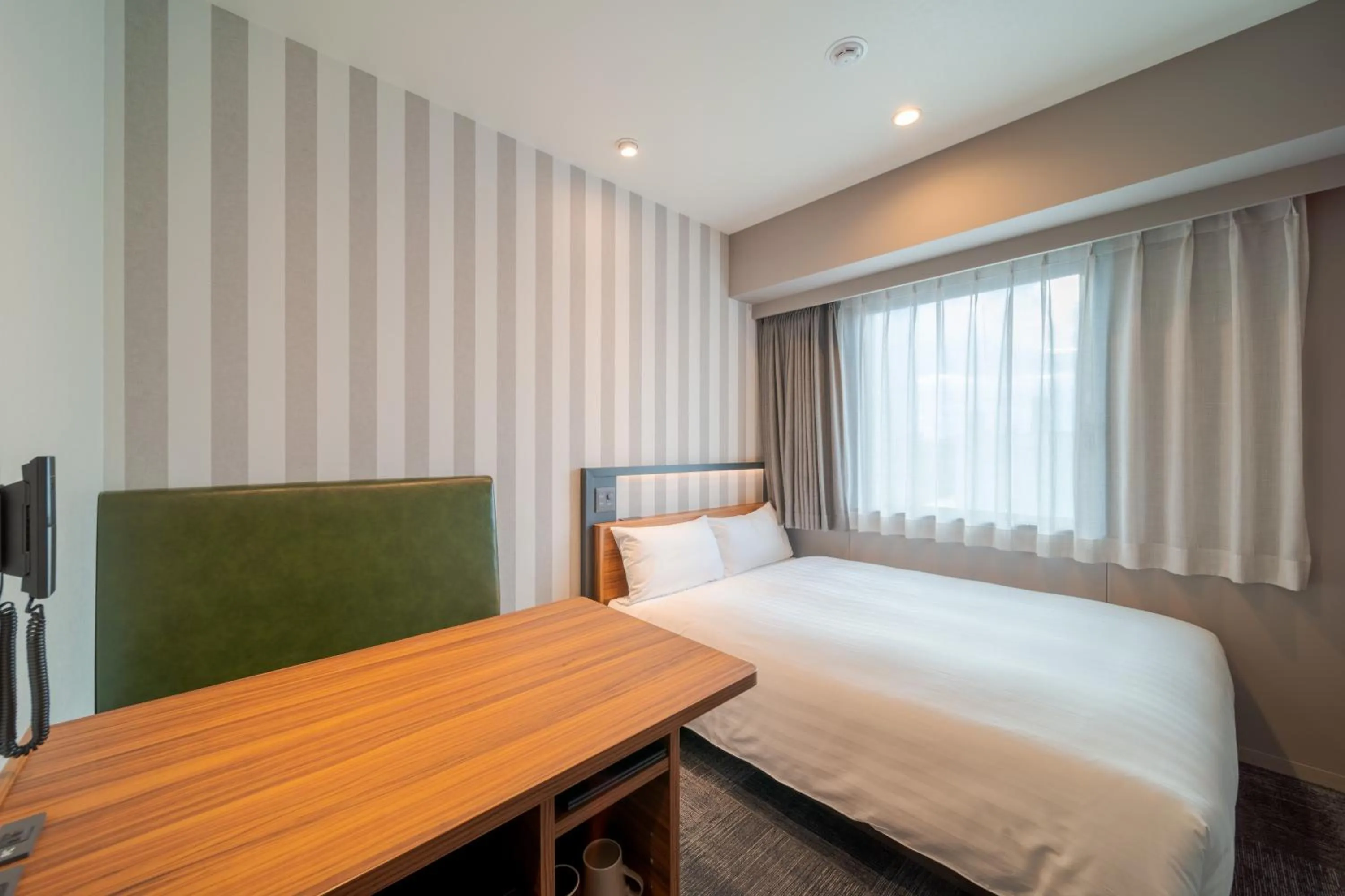 Bed in Via Inn Prime Osaka Kyobashi