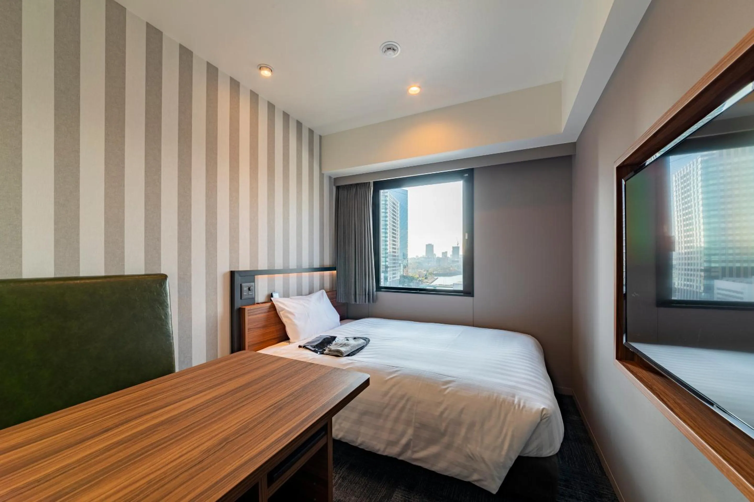 Bed in Via Inn Prime Osaka Kyobashi