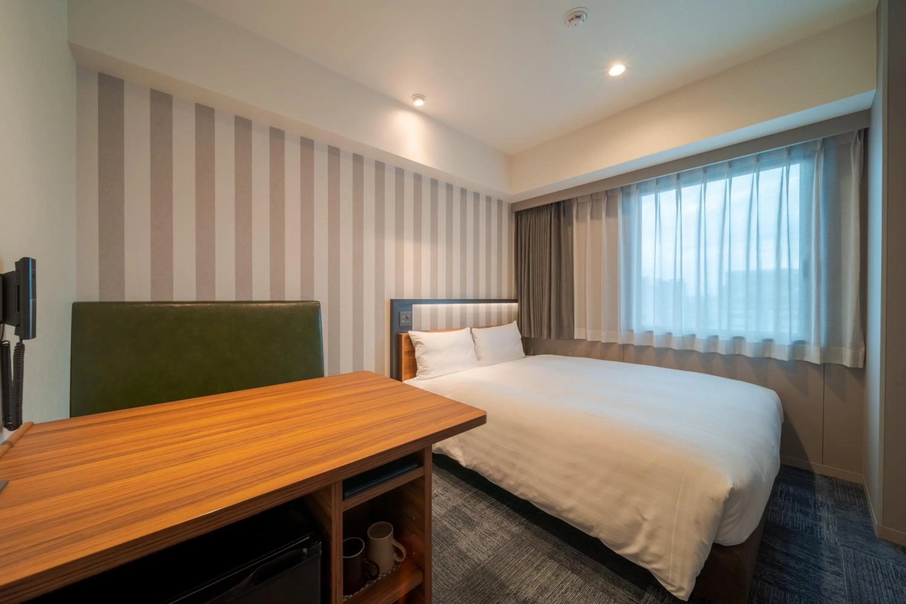 Bed in Via Inn Prime Osaka Kyobashi