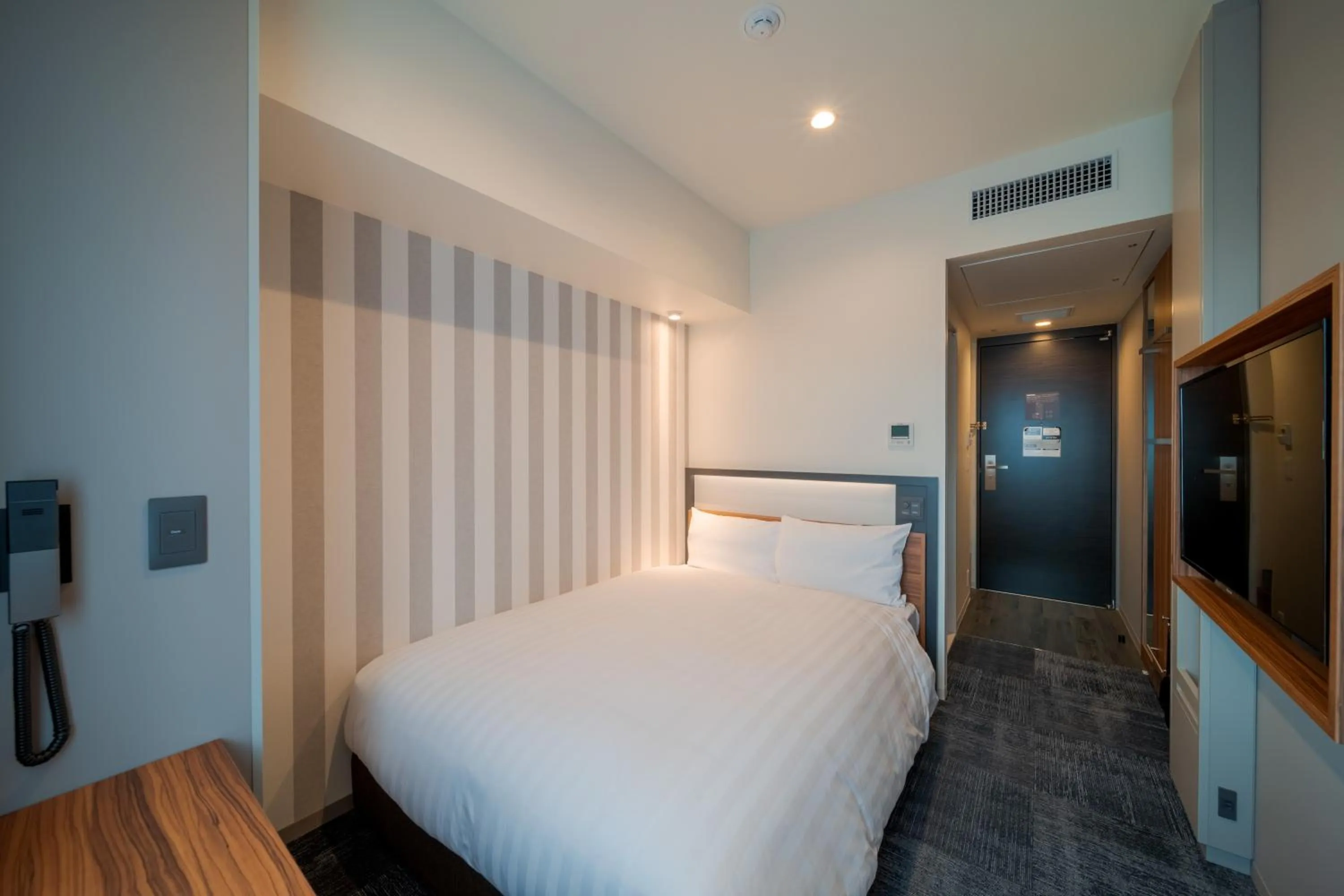 Bed in Via Inn Prime Osaka Kyobashi