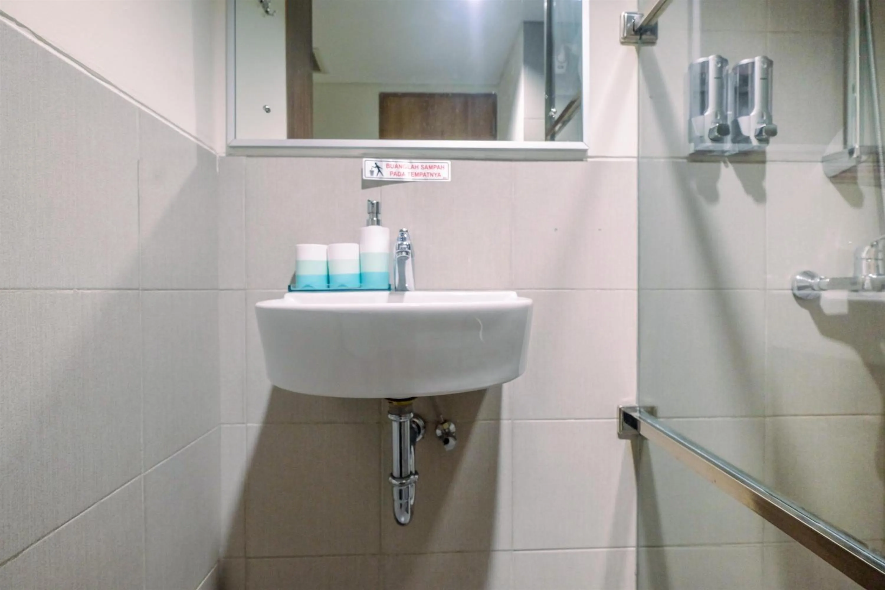 Bathroom in Stunning Studio Apartment at Bogor Icon By Travelio