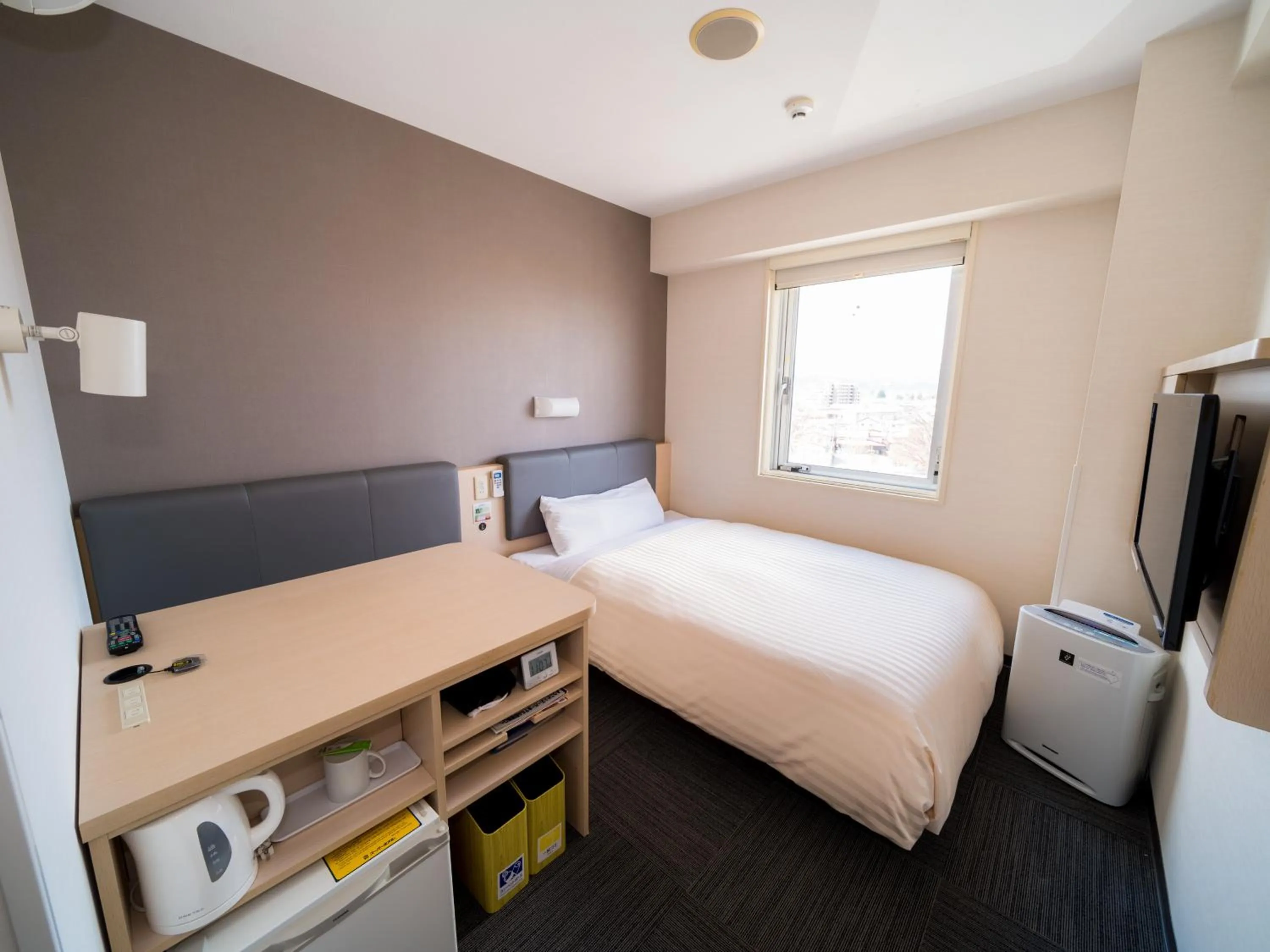 Bed in Super Hotel Yamagataeki Nishiguchi Hot Spring