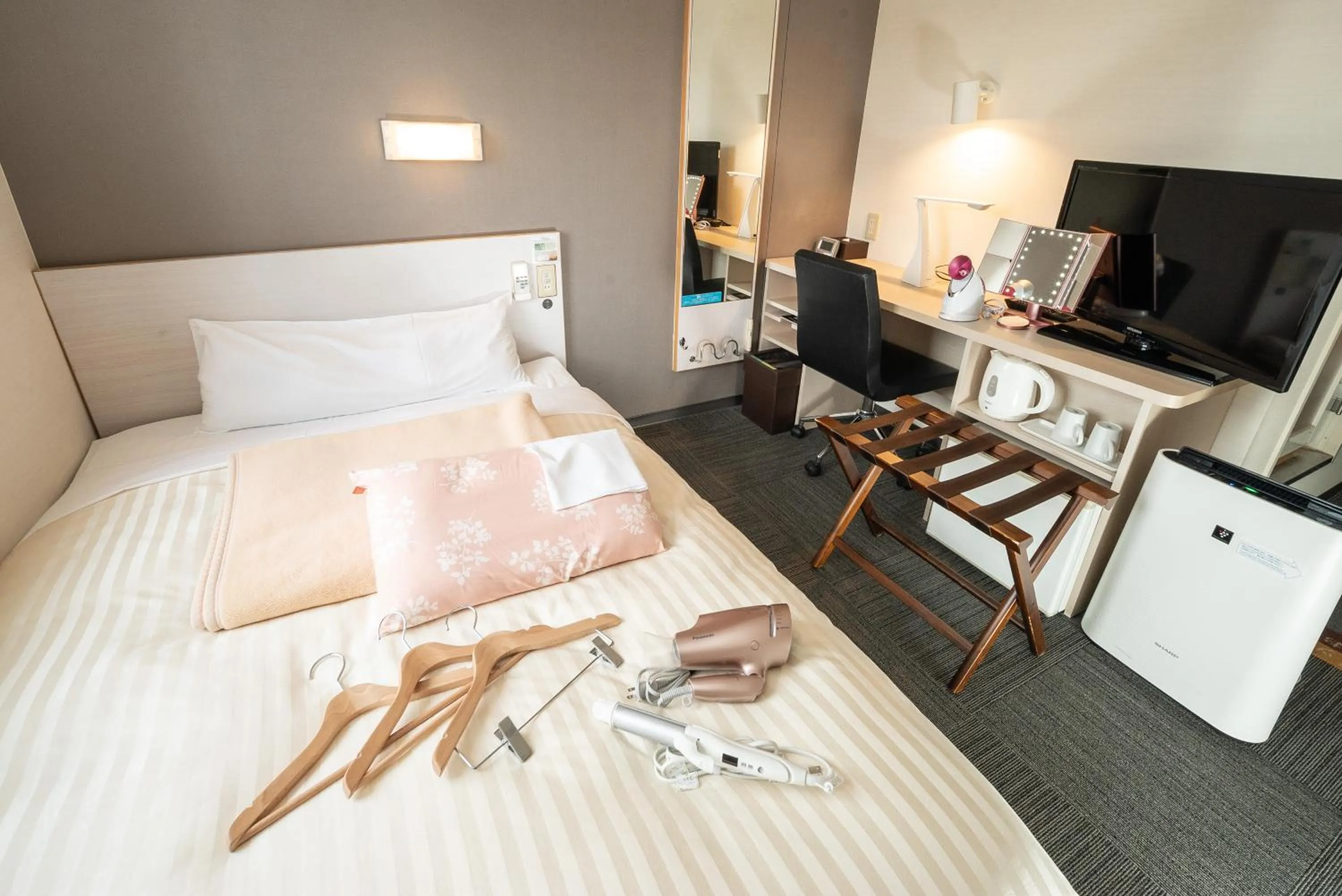 Bed in Super Hotel Yamagataeki Nishiguchi Hot Spring