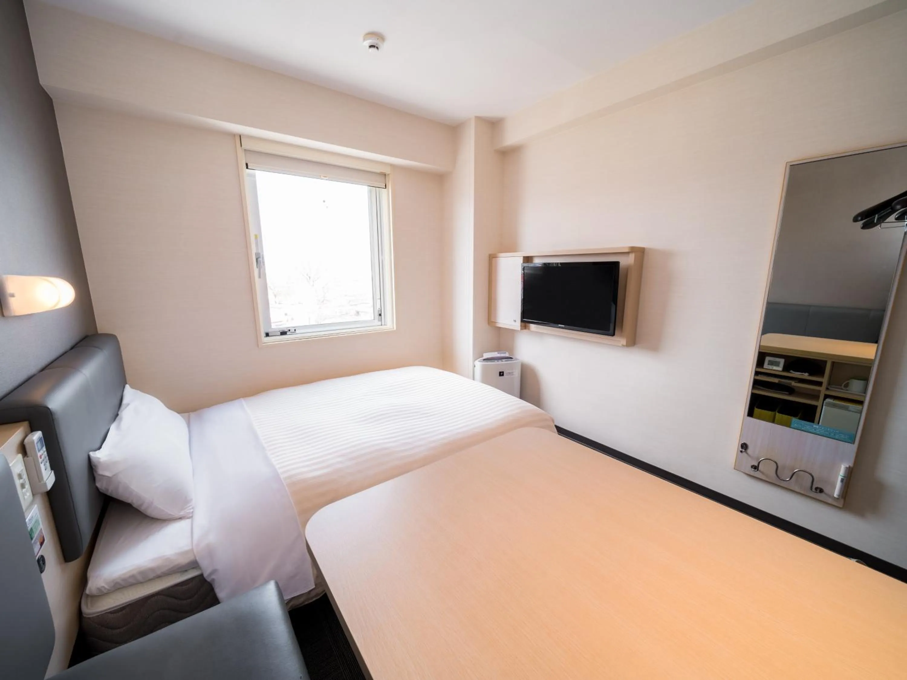 Bed in Super Hotel Yamagataeki Nishiguchi Hot Spring