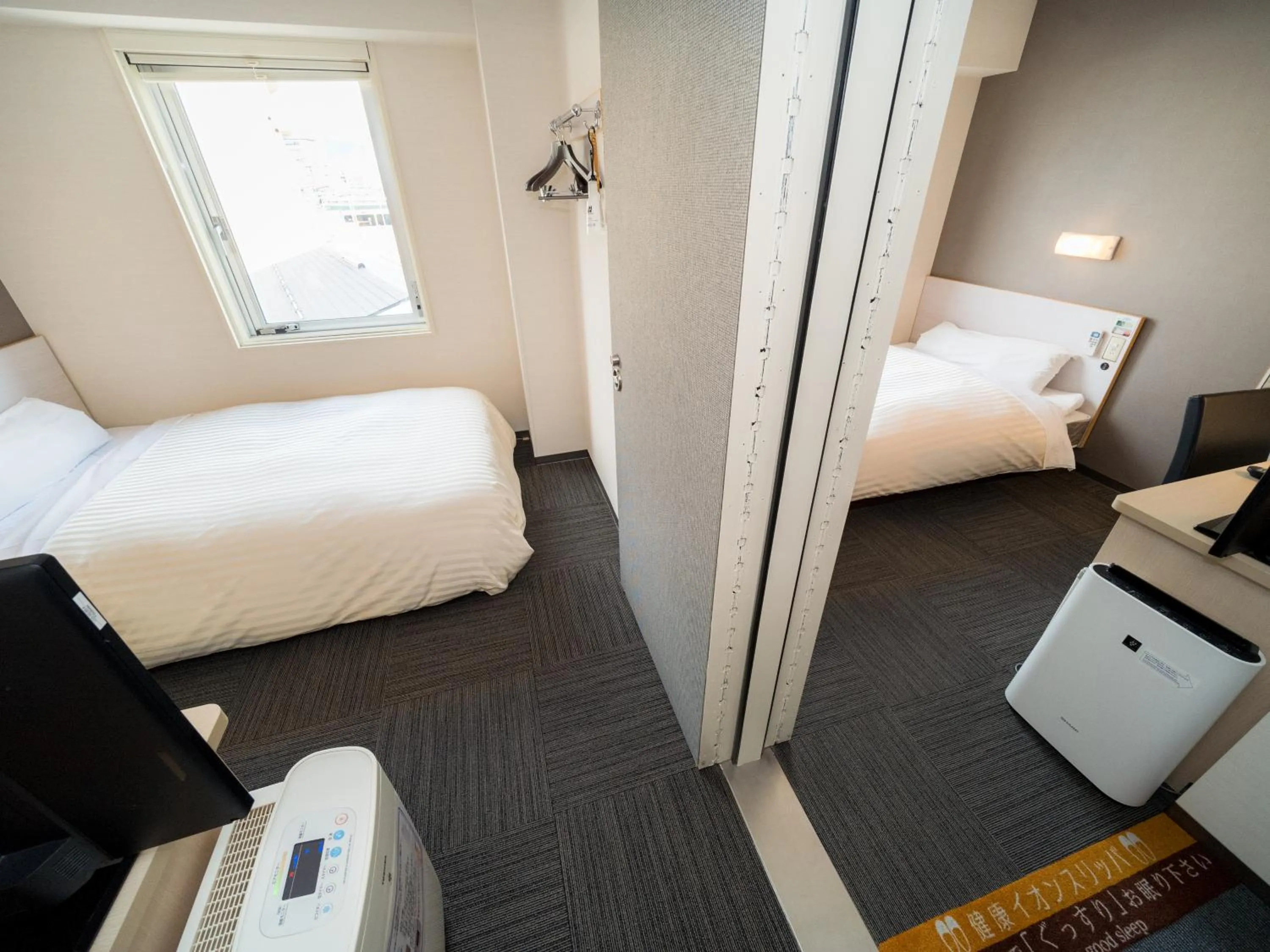 Bed in Super Hotel Yamagataeki Nishiguchi Hot Spring