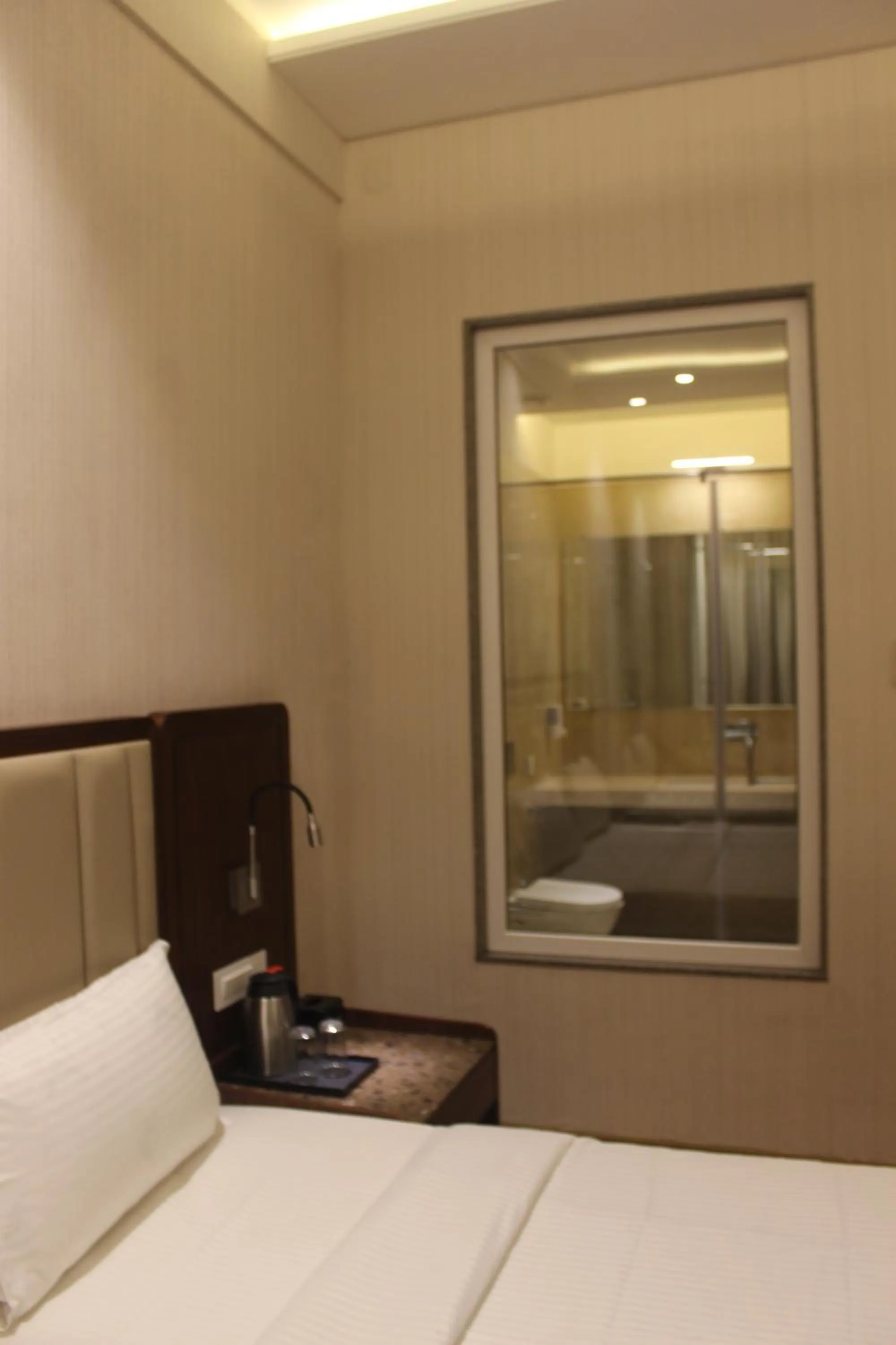 Bedroom, Bed in HOTEL RAJHANS ABHINANDAN