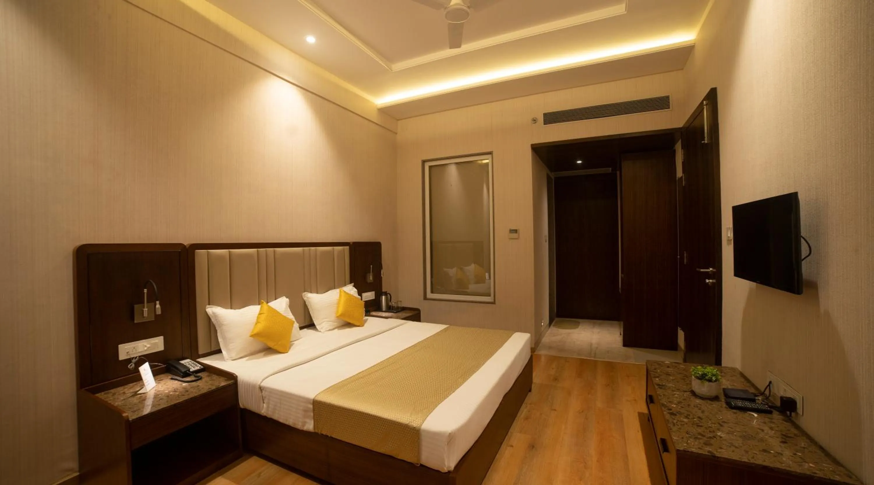 Bed in HOTEL RAJHANS ABHINANDAN