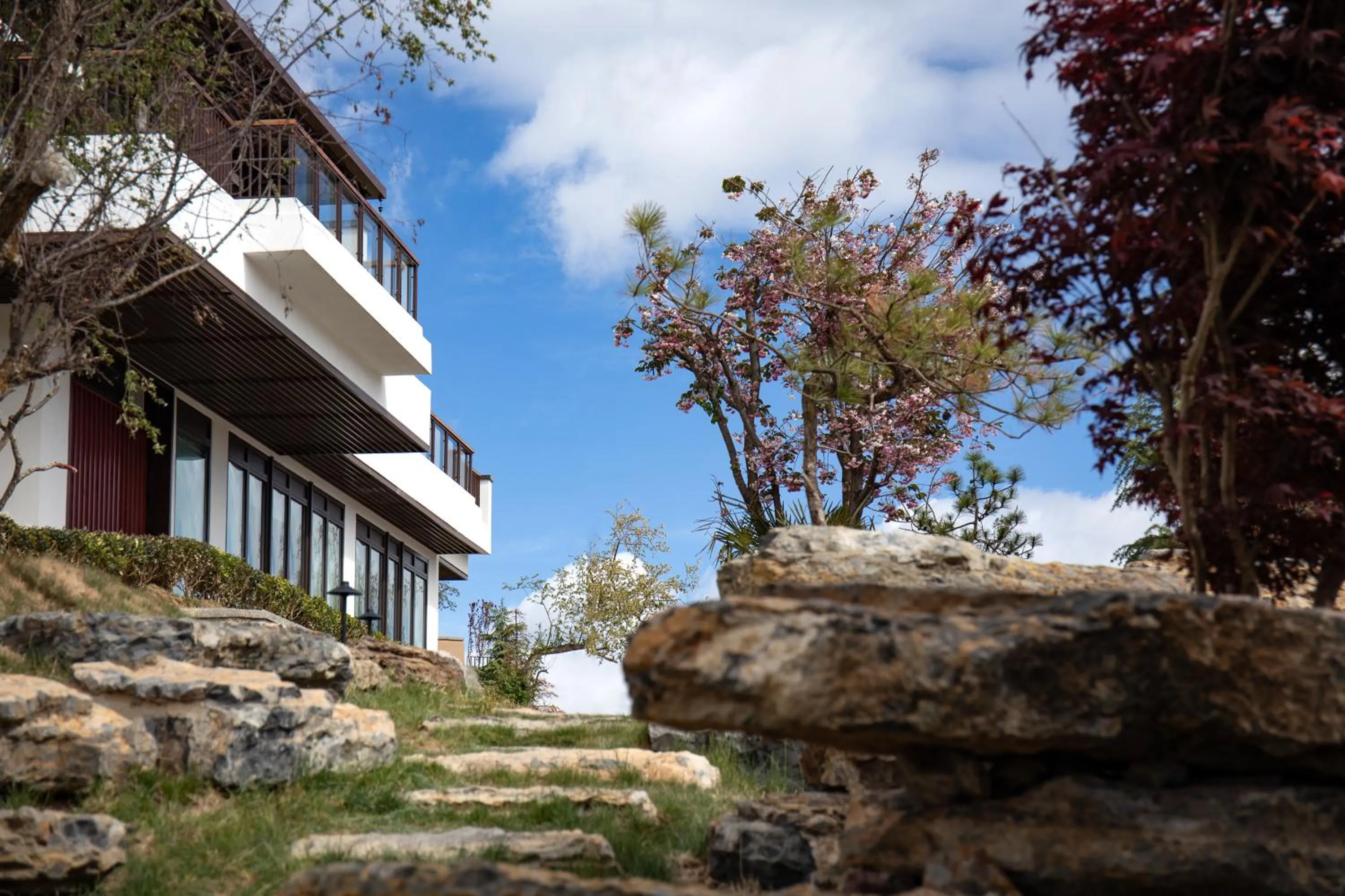 Property building in Hotel Indigo Diqing Moonlight City by IHG