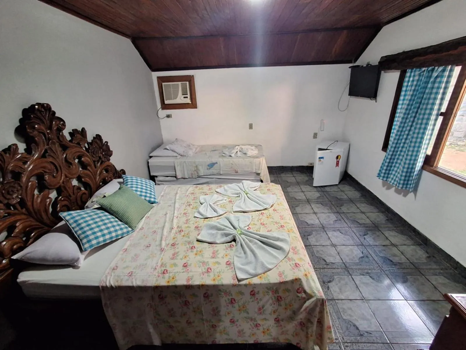 Bed in Pousada Nova Conquista