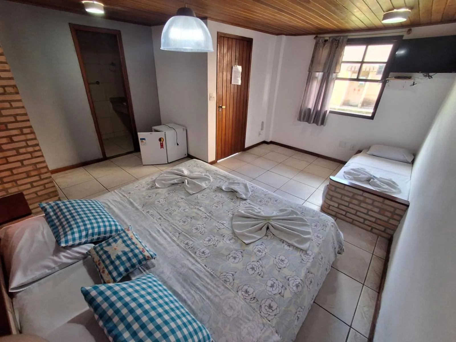 Bed in Pousada Nova Conquista