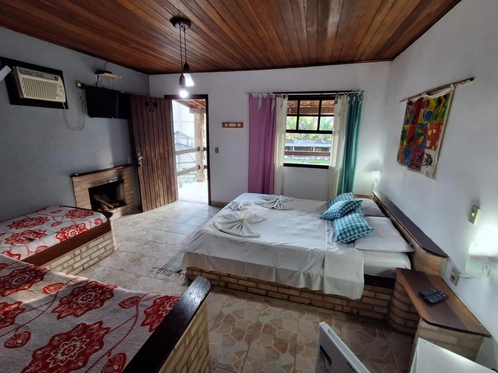 Bed in Pousada Nova Conquista