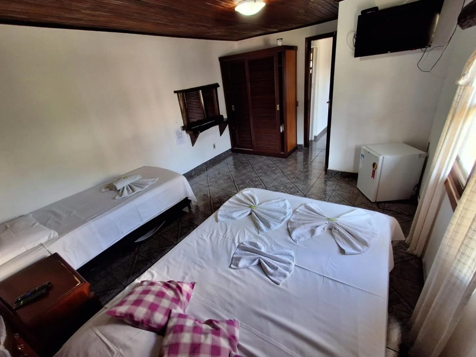 Bed in Pousada Nova Conquista