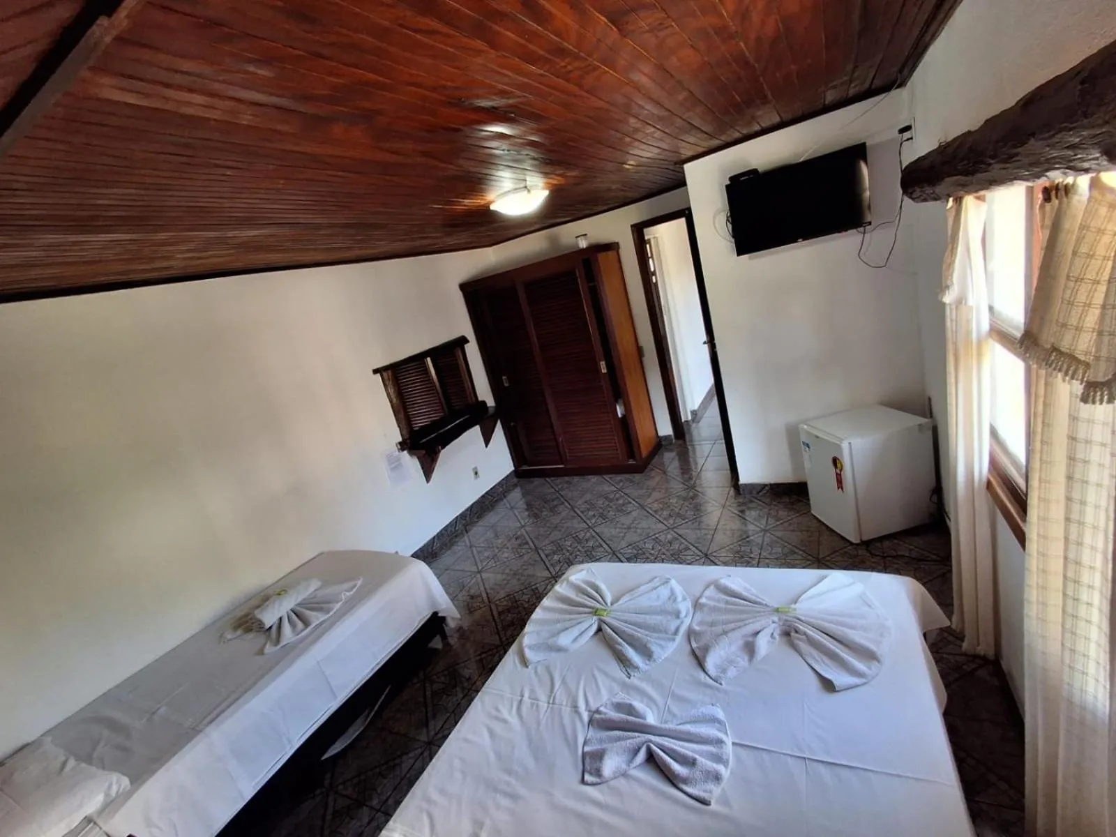 Bed in Pousada Nova Conquista