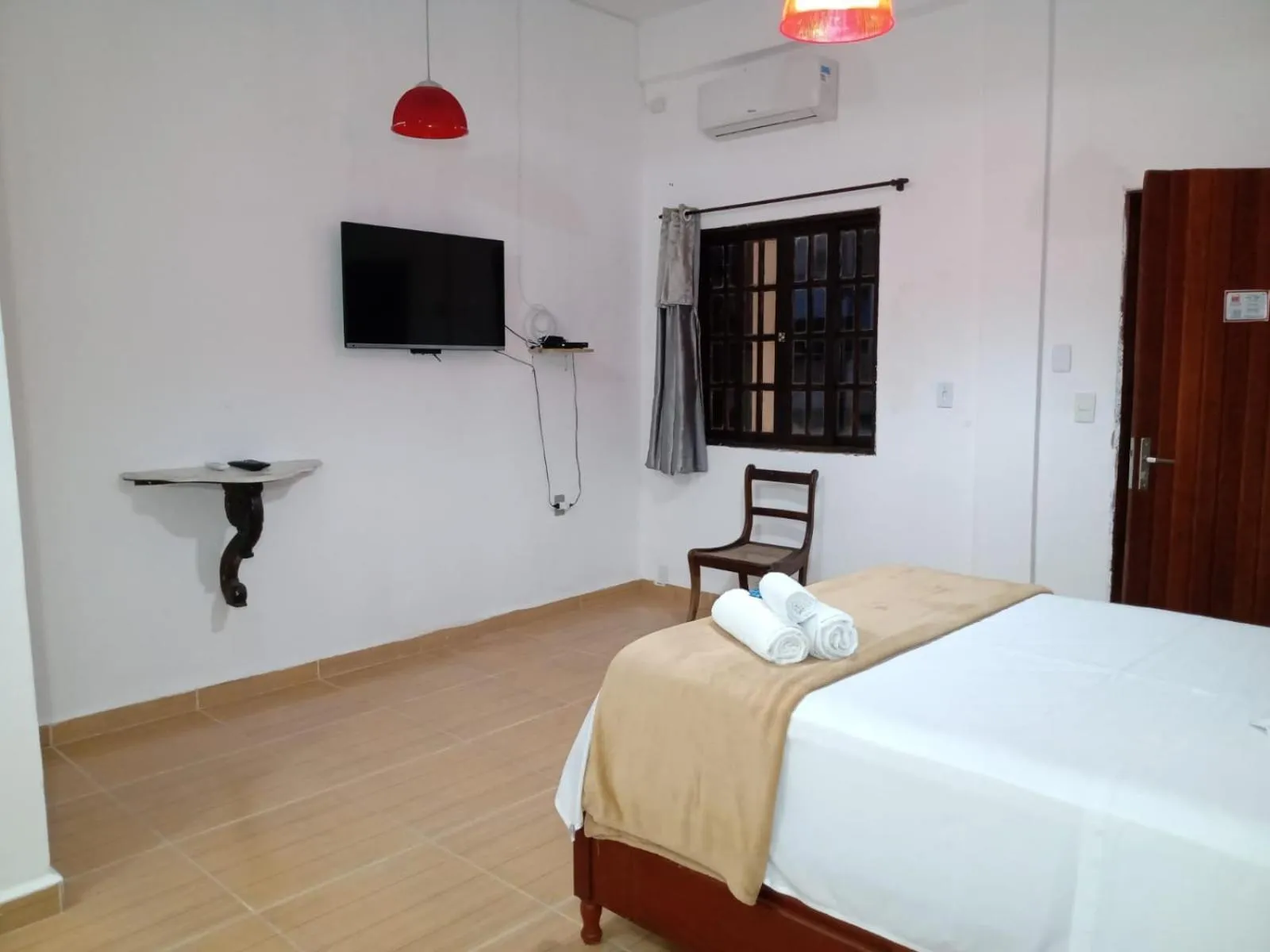 Bed in Pousada Nova Conquista