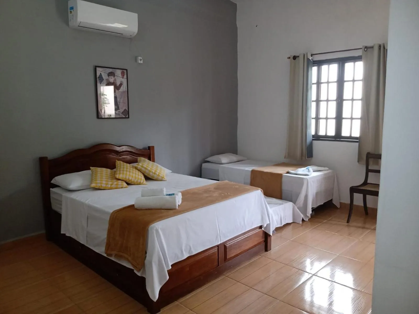 Bed in Pousada Nova Conquista