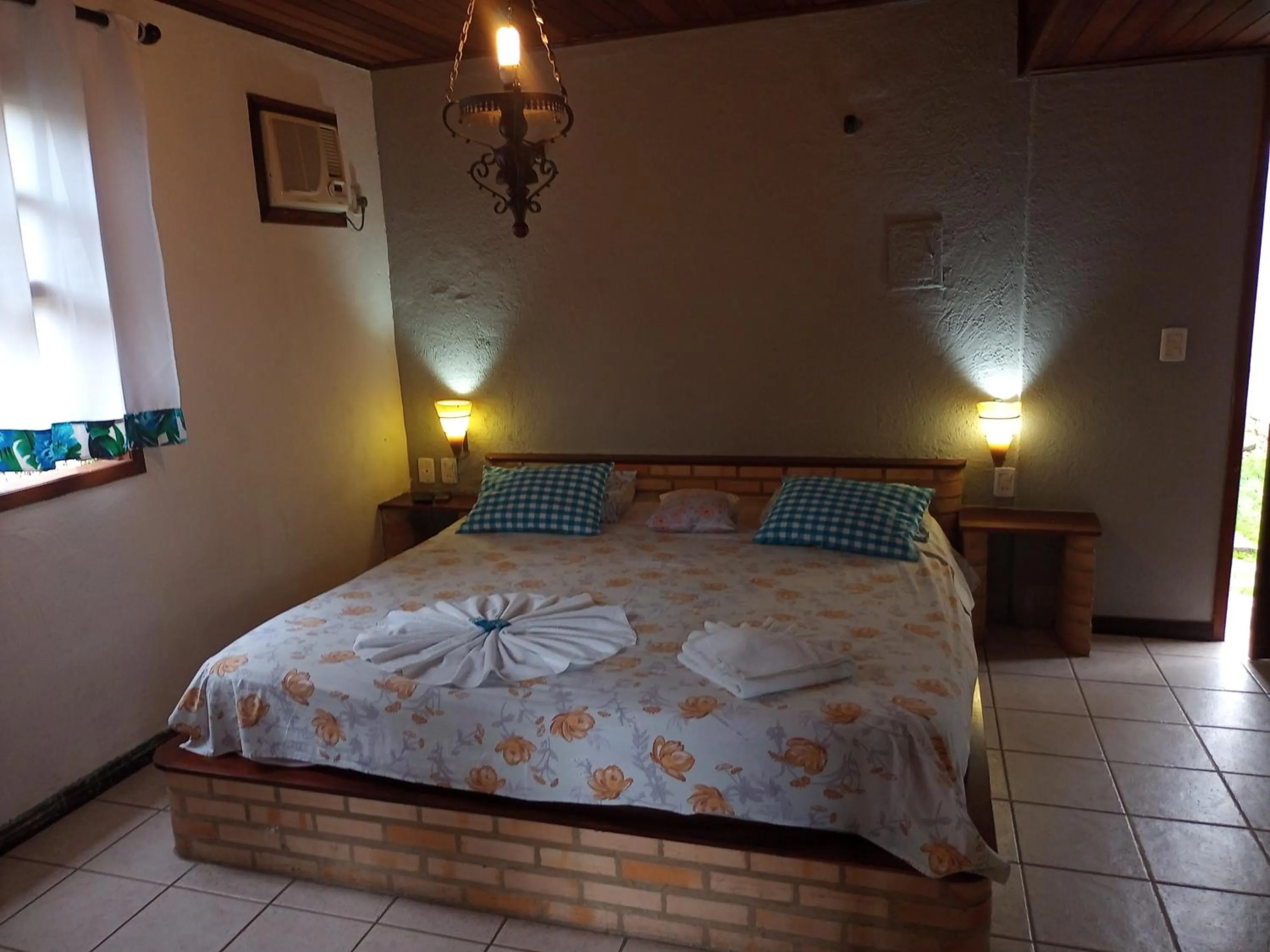 Bed in Pousada Nova Conquista