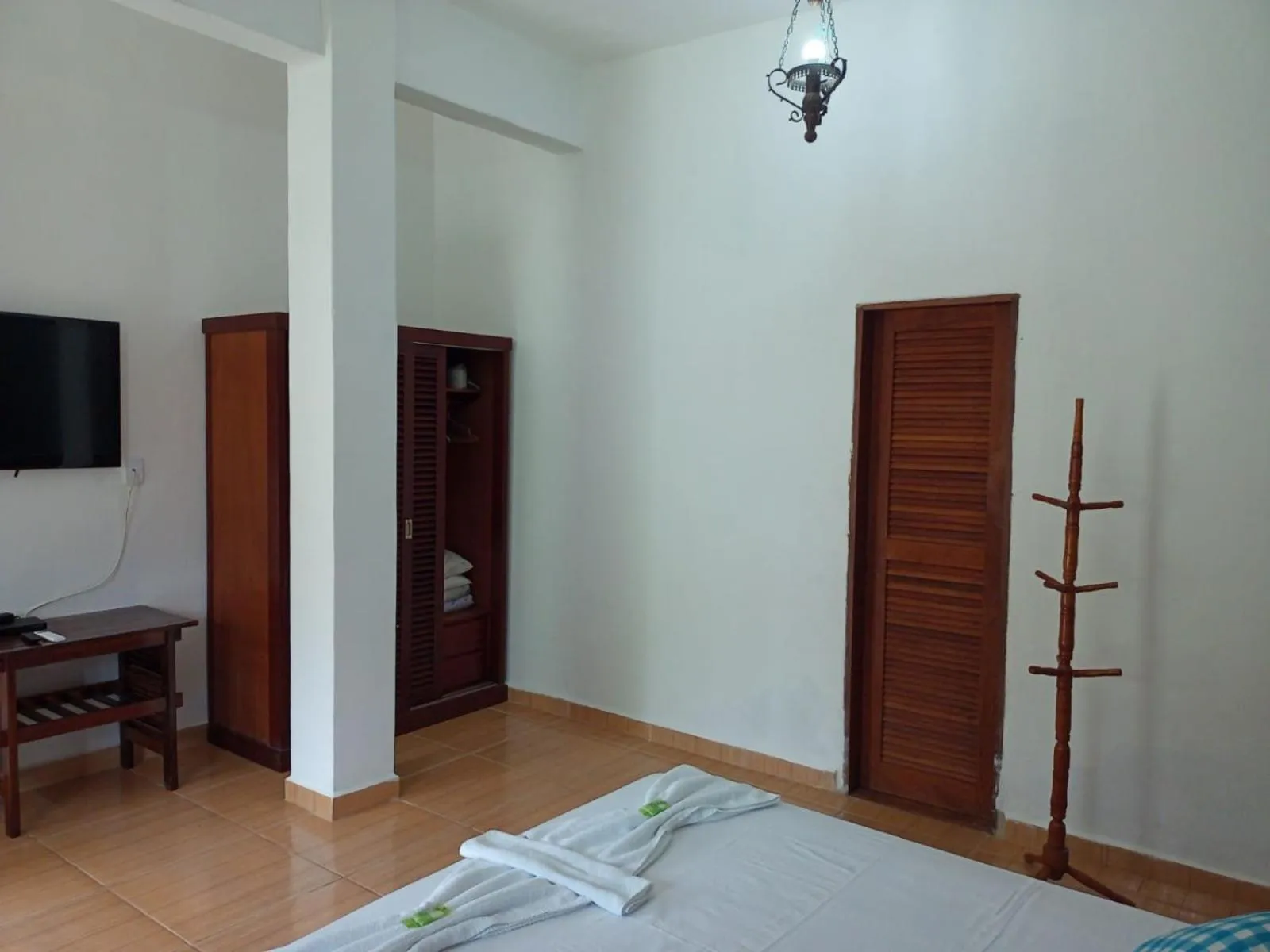 Bed in Pousada Nova Conquista