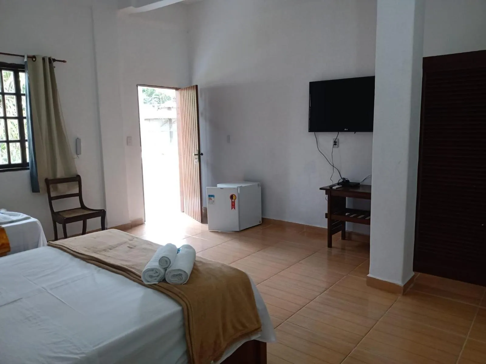 Bed in Pousada Nova Conquista