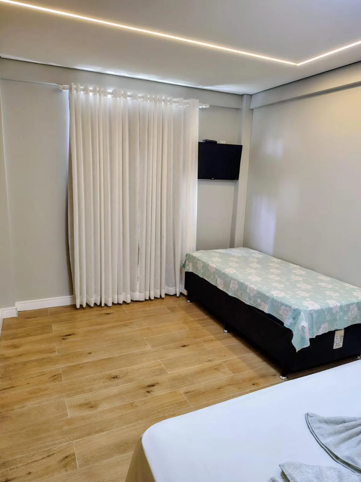 Bed in Pousada Nova Conquista