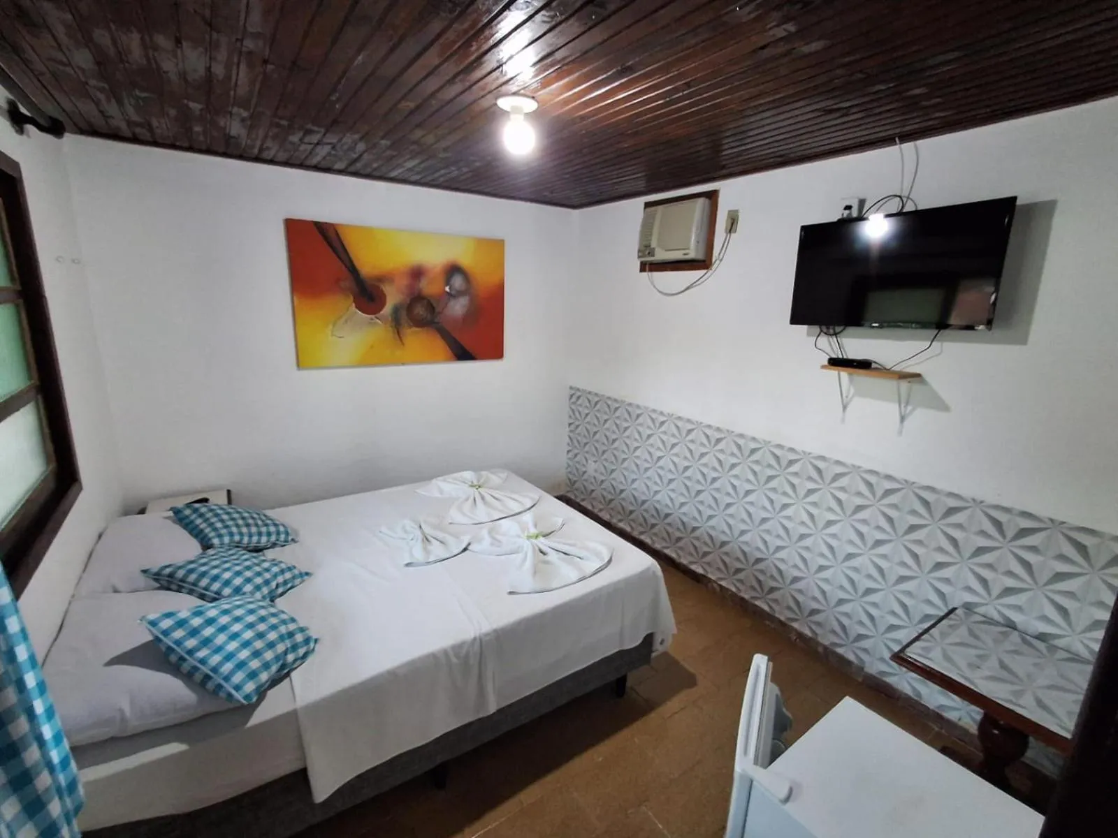 Bed in Pousada Nova Conquista