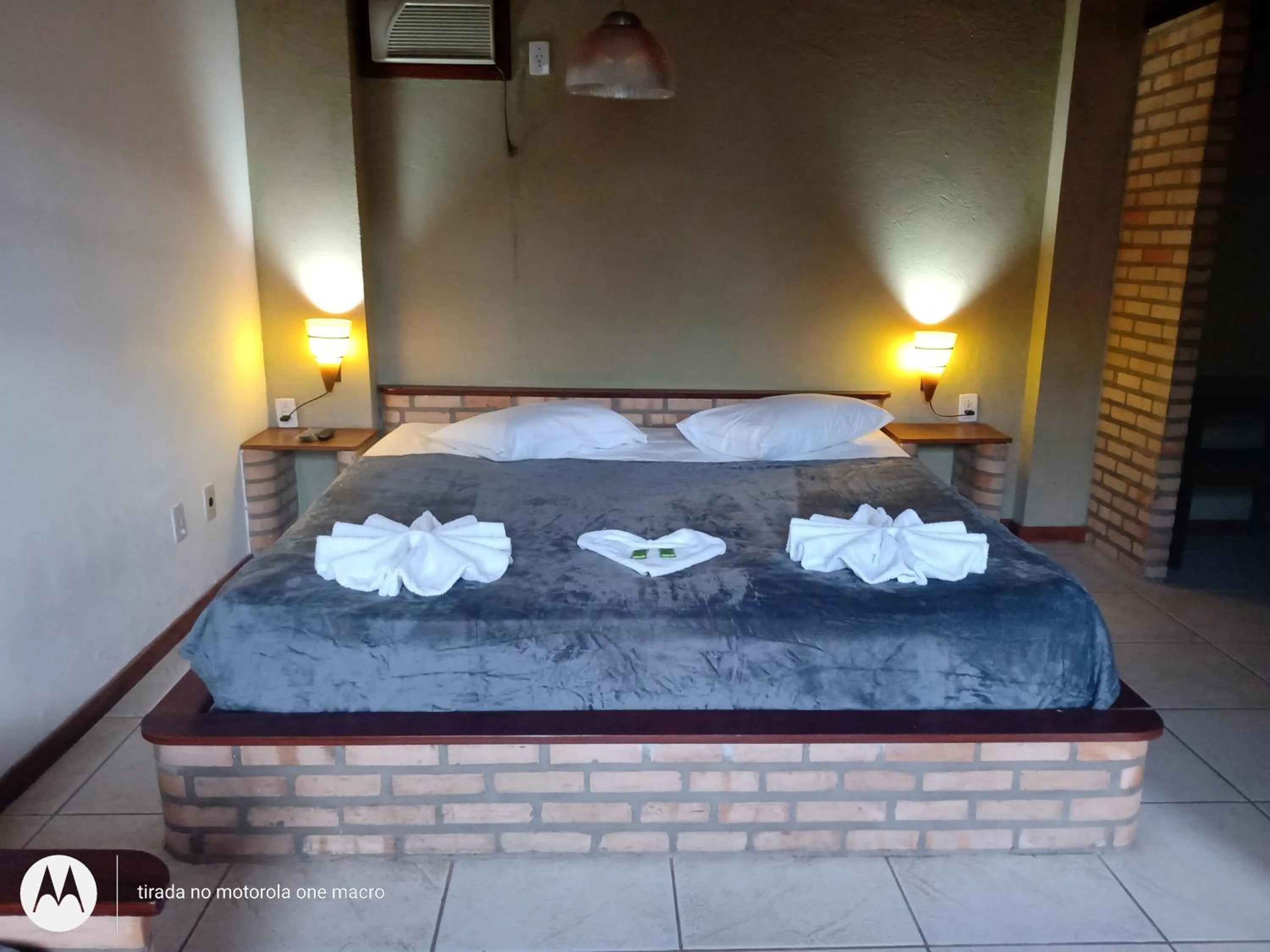 Bed in Pousada Nova Conquista