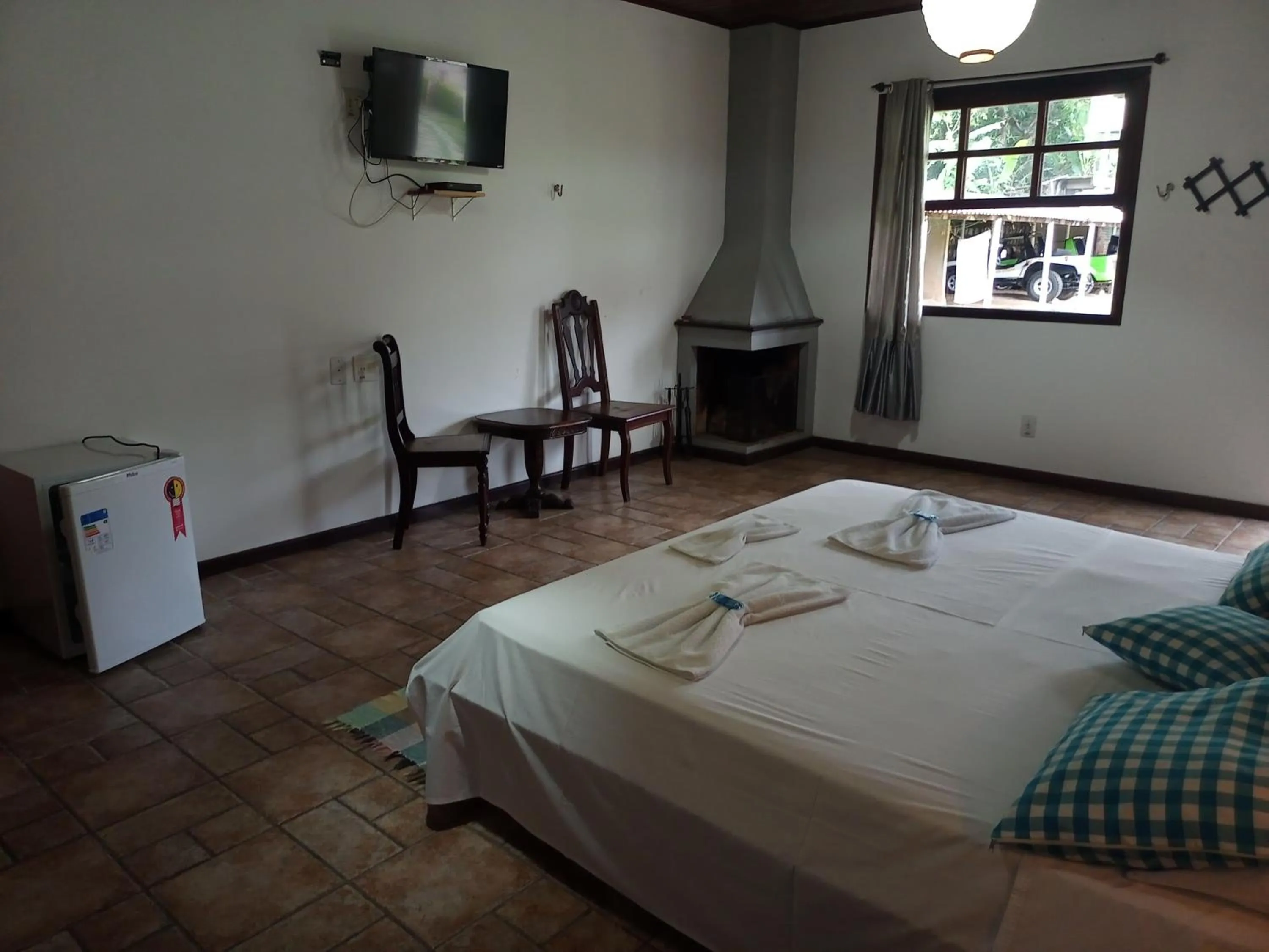 Bed in Pousada Nova Conquista