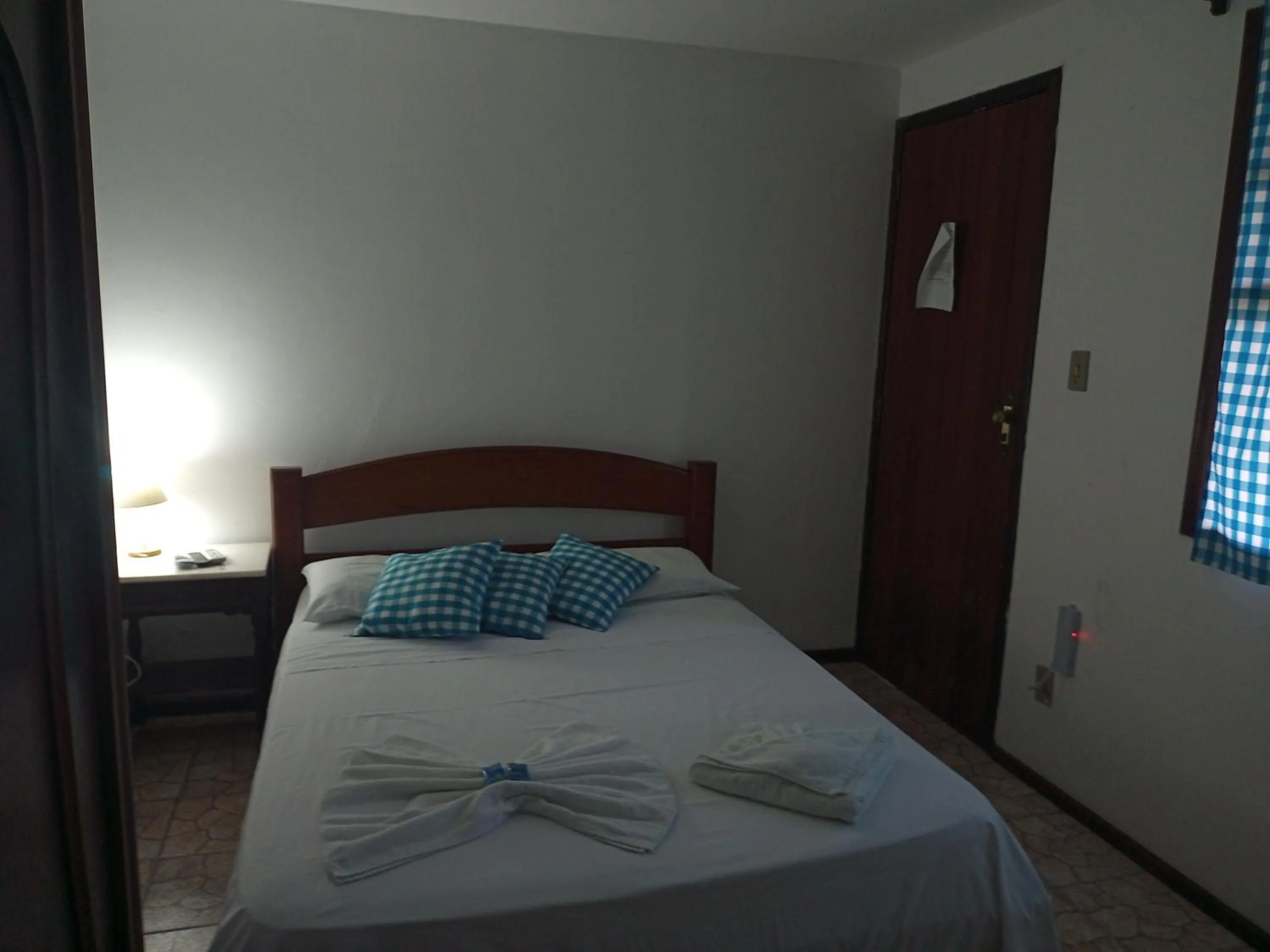 Bed in Pousada Nova Conquista