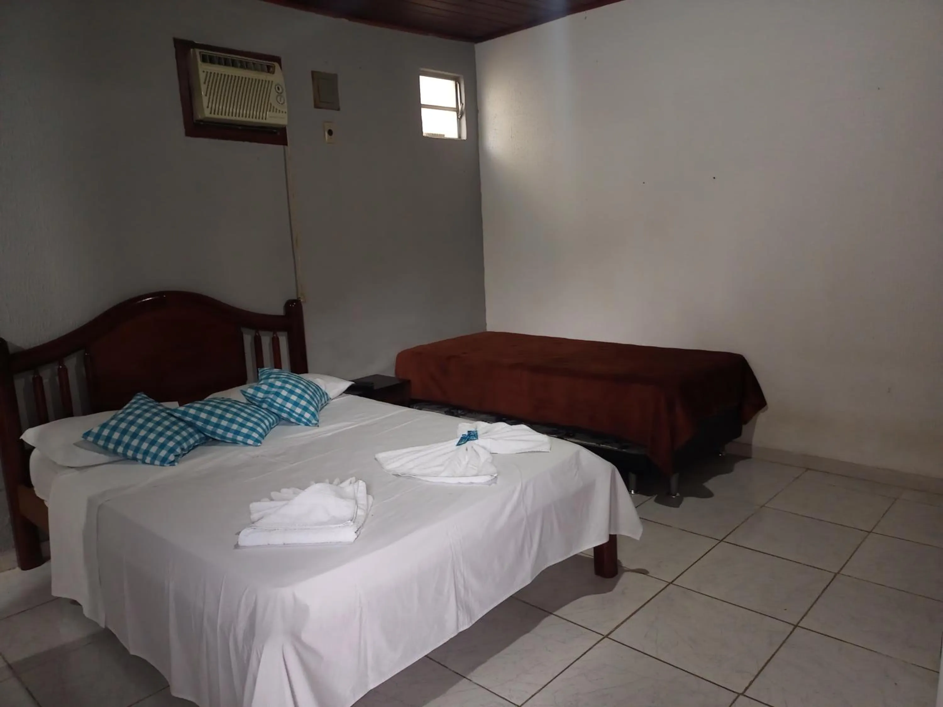 Bed in Pousada Nova Conquista