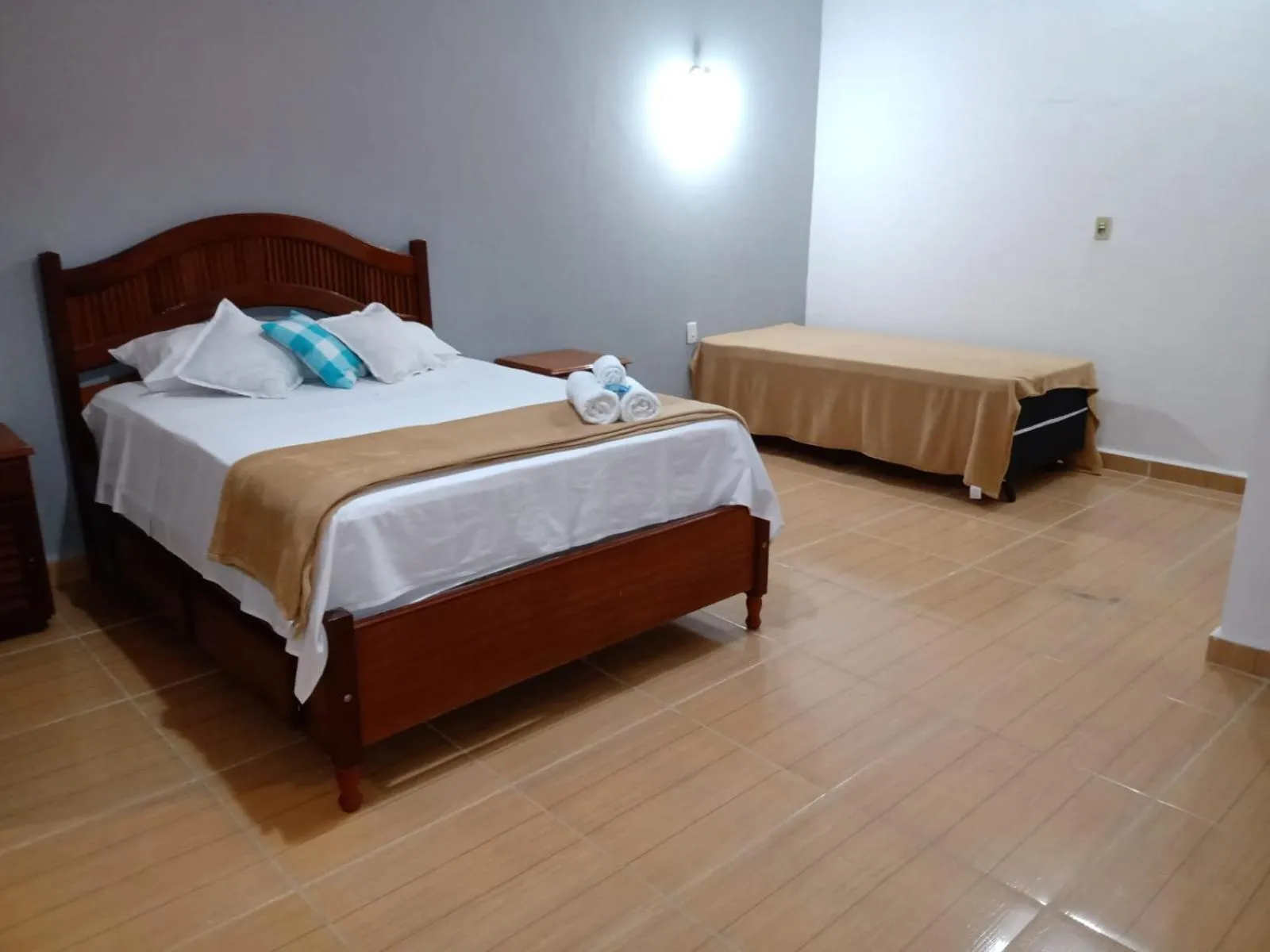 Bed in Pousada Nova Conquista