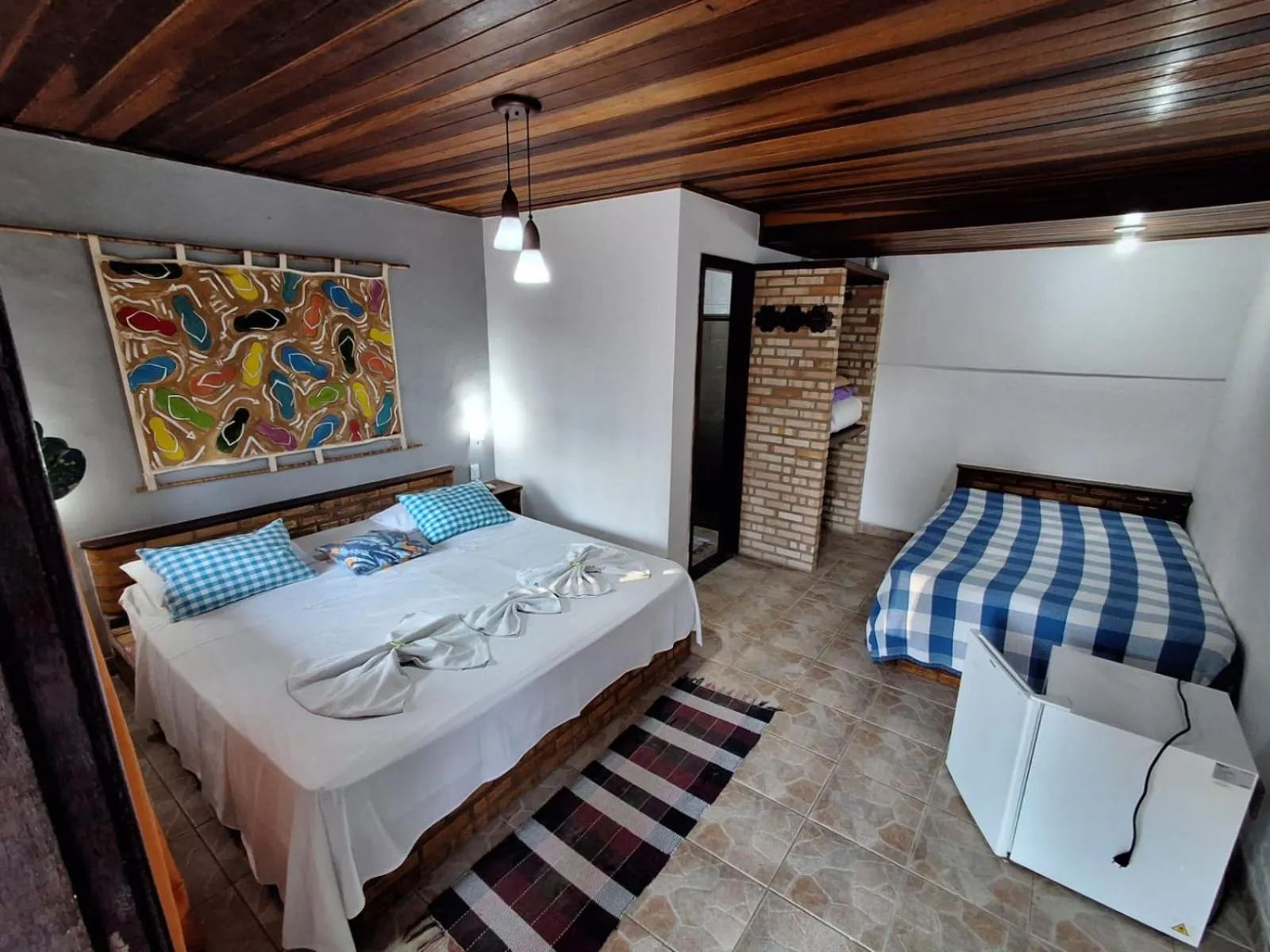 Bed in Pousada Nova Conquista