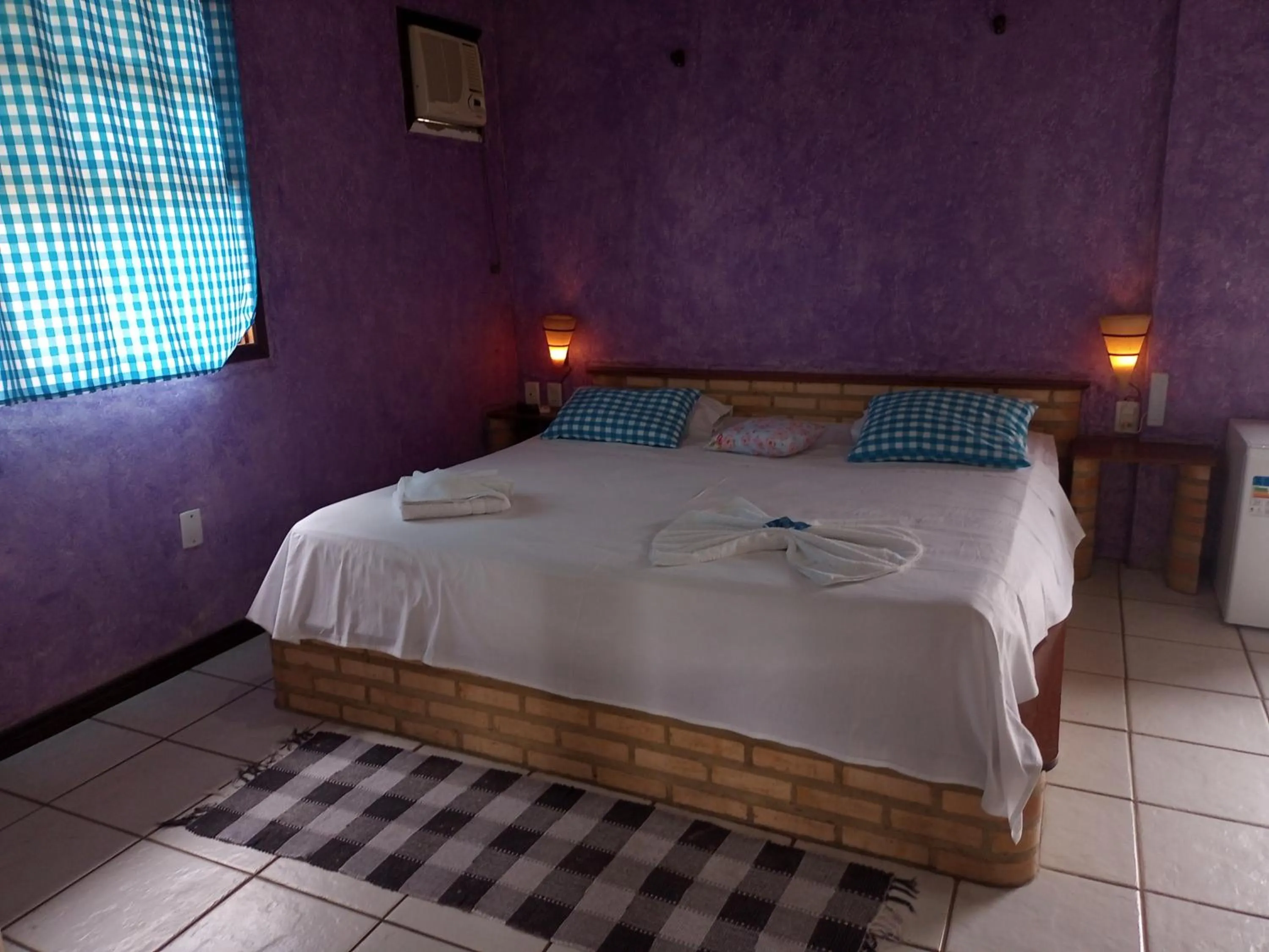 Bed in Pousada Nova Conquista