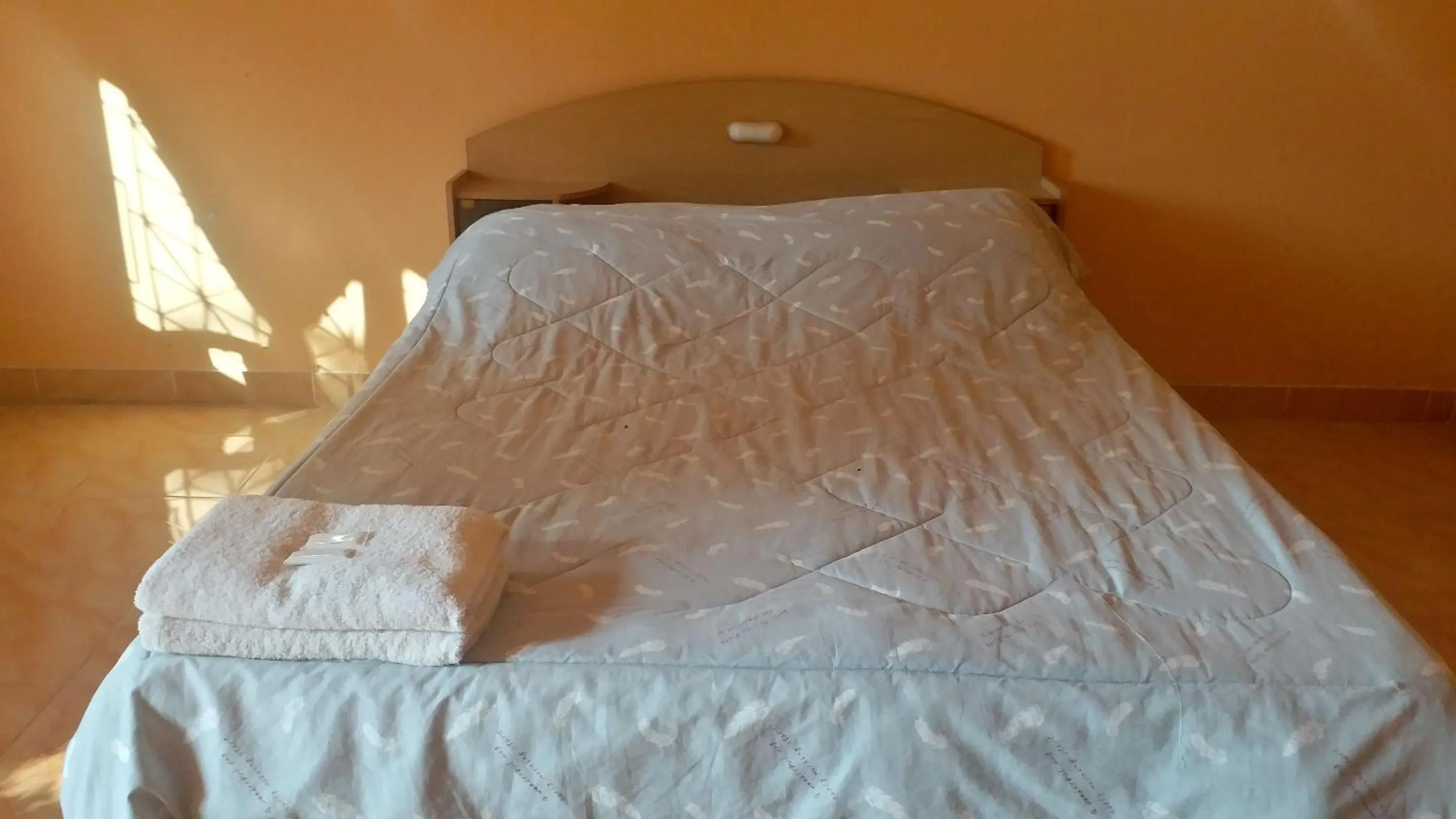 Photo of the whole room, Bed in The 99 Inn Hotel