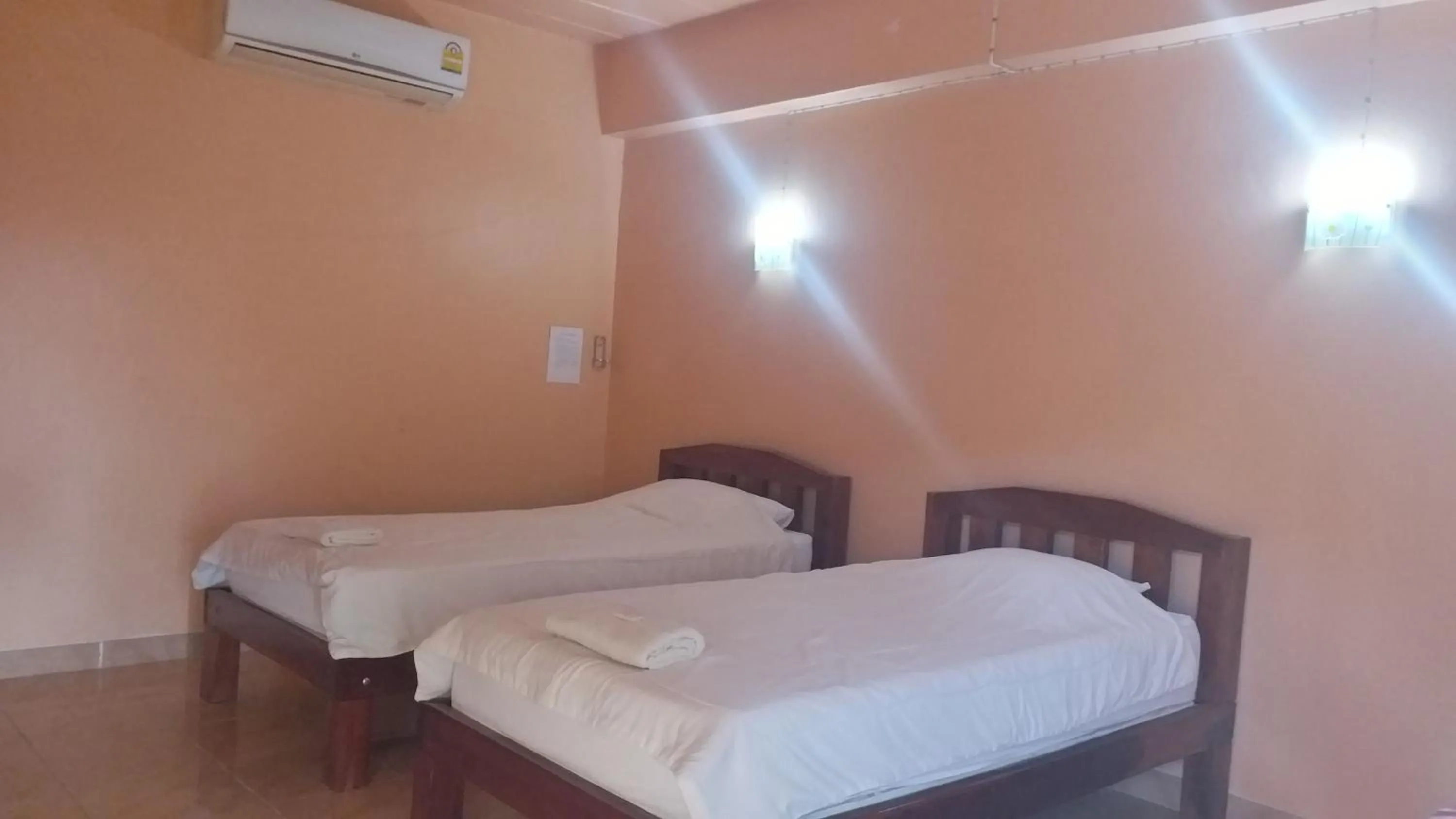 Photo of the whole room, Bed in The 99 Inn Hotel