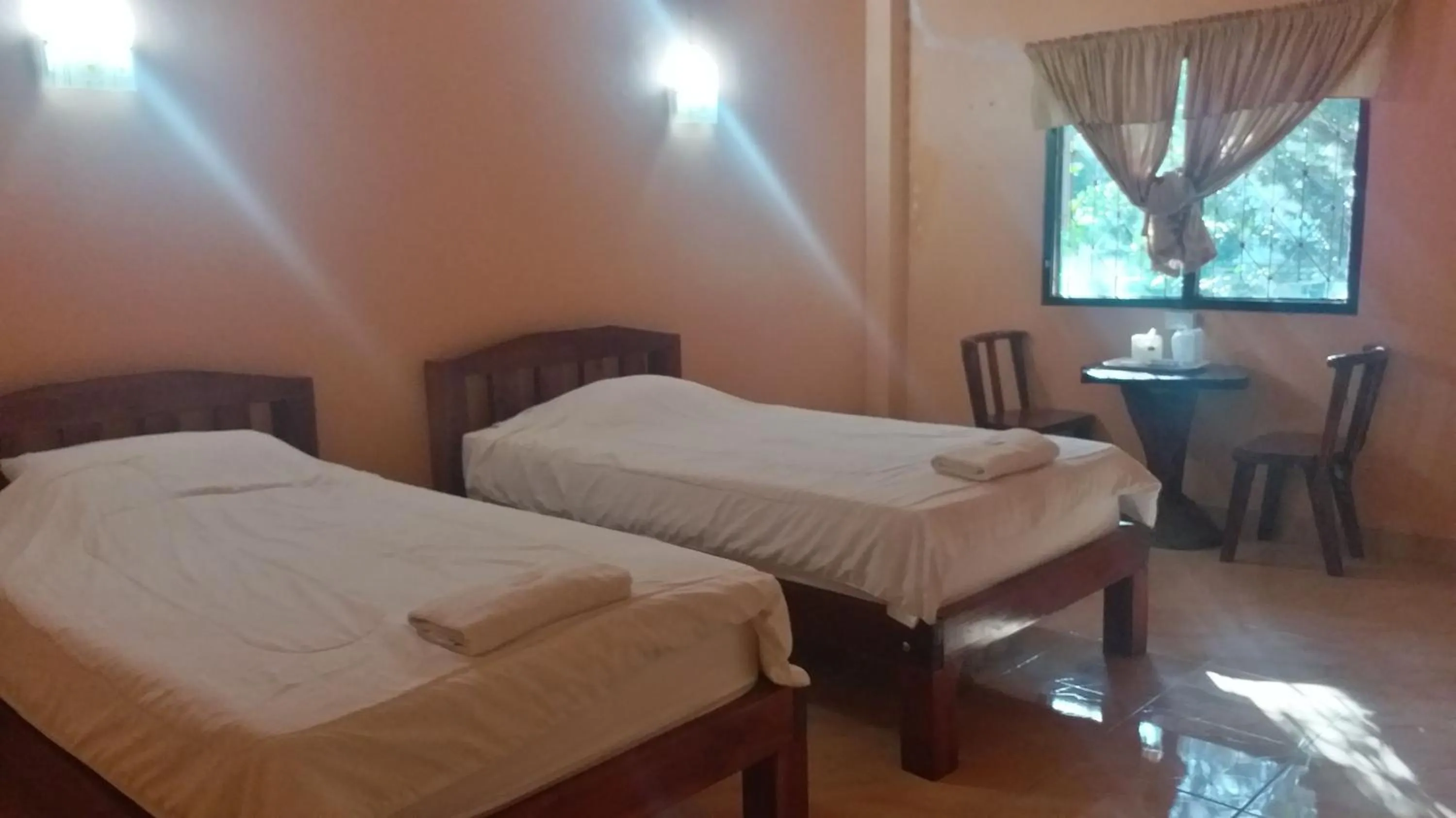 Photo of the whole room, Bed in The 99 Inn Hotel