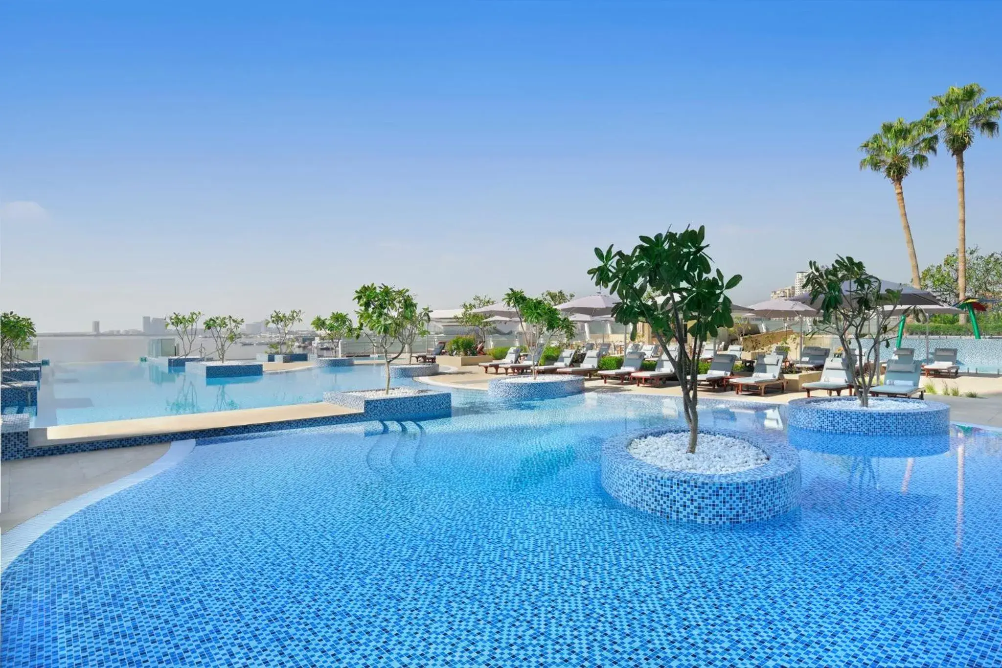 Swimming pool in InterContinental Dubai Festival City by IHG Swimming pool in InterContinental Dubai Festival City by IHG