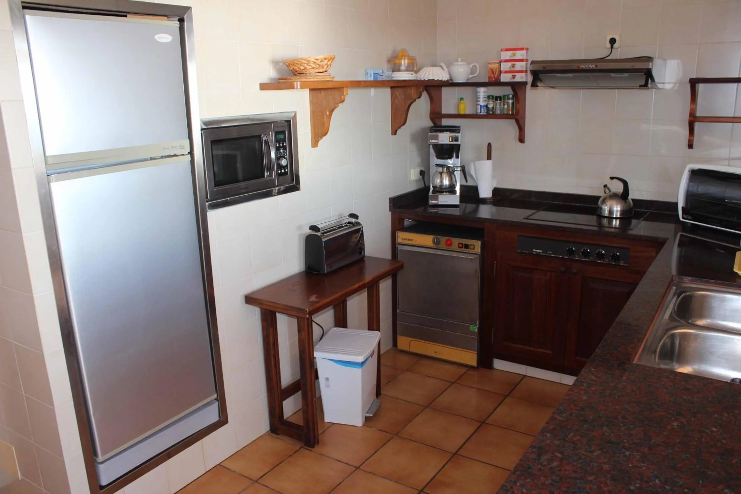 Kitchen or kitchenette in Chalets Torre Nova
