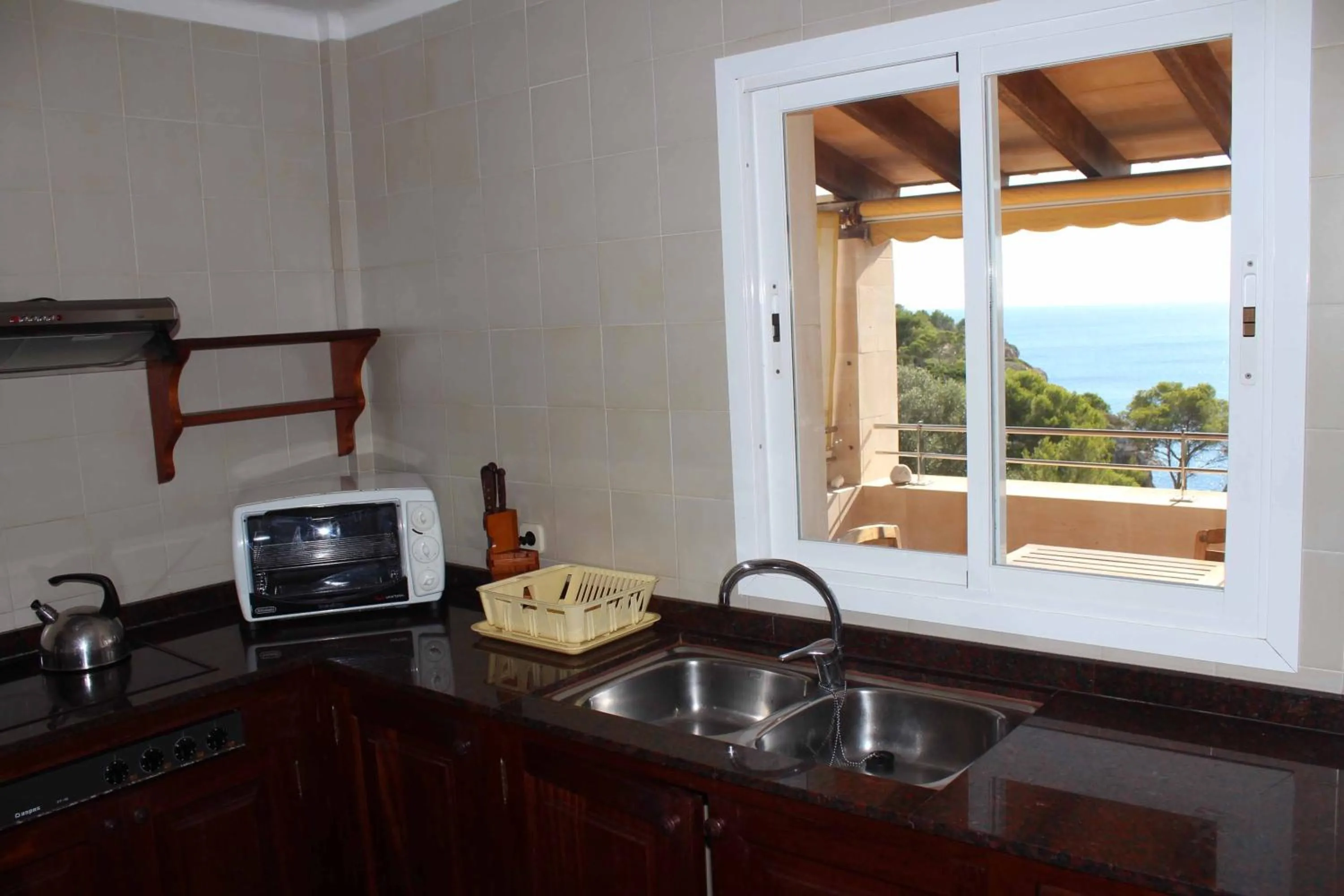 Kitchen or kitchenette in Chalets Torre Nova