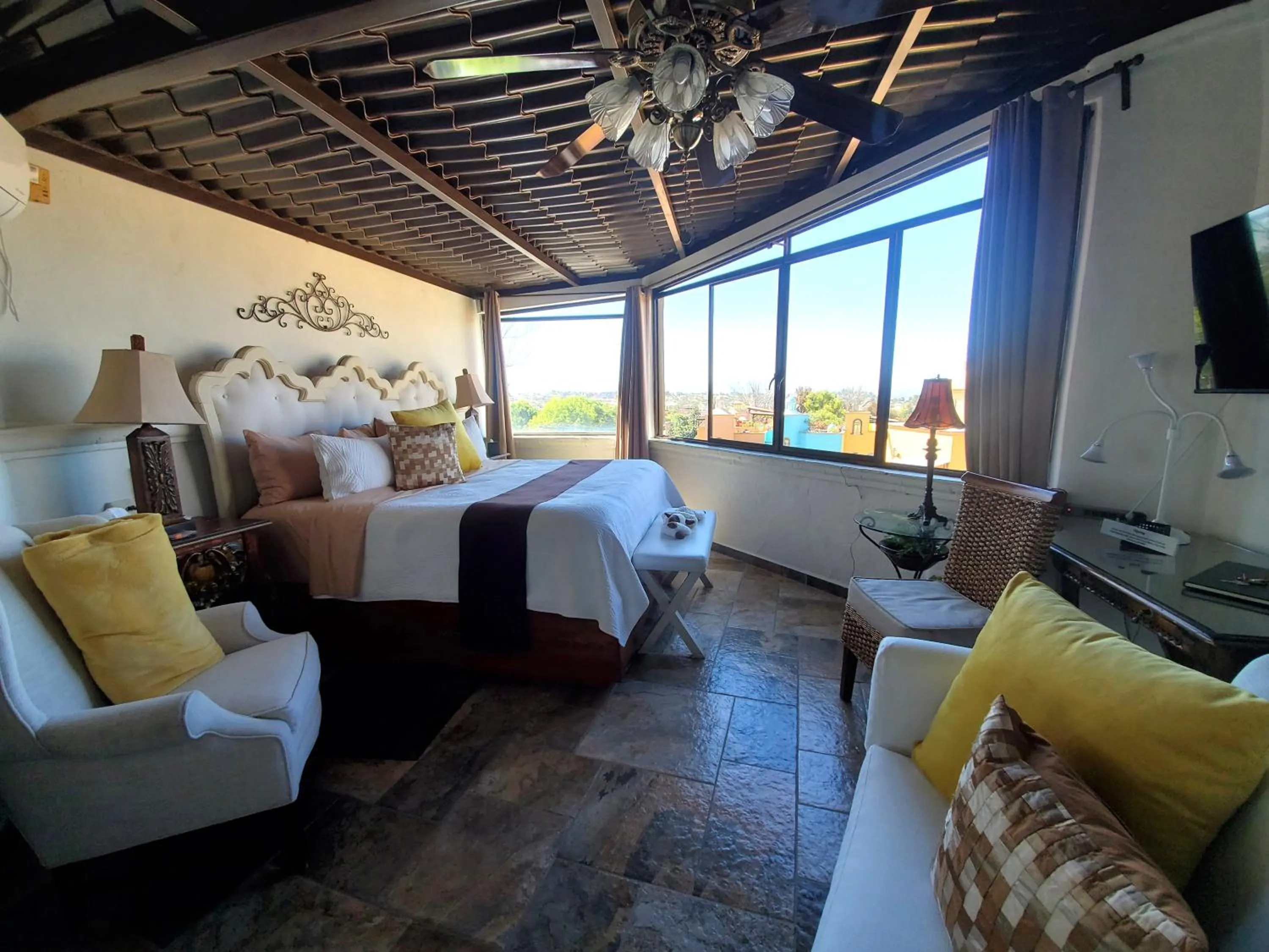 Quiet street view, Bed in Casa Grande Luxury Boutique Hotel