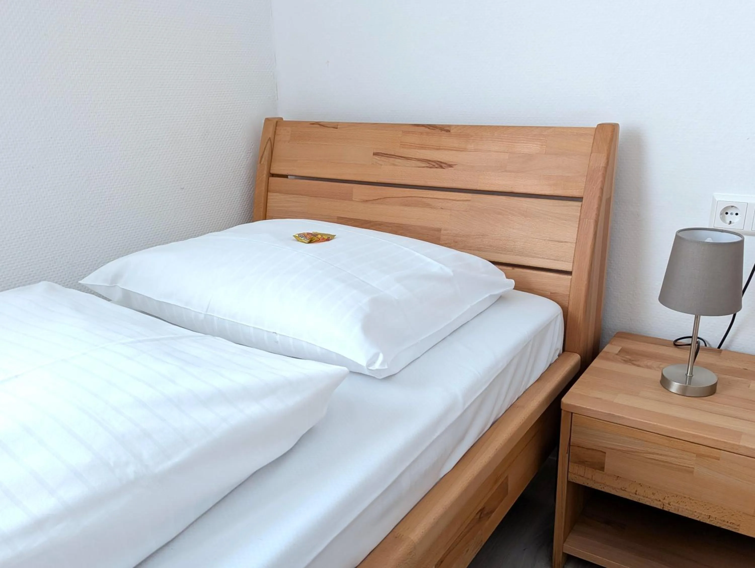 Photo of the whole room, Bed in City Hotel Stuttgart