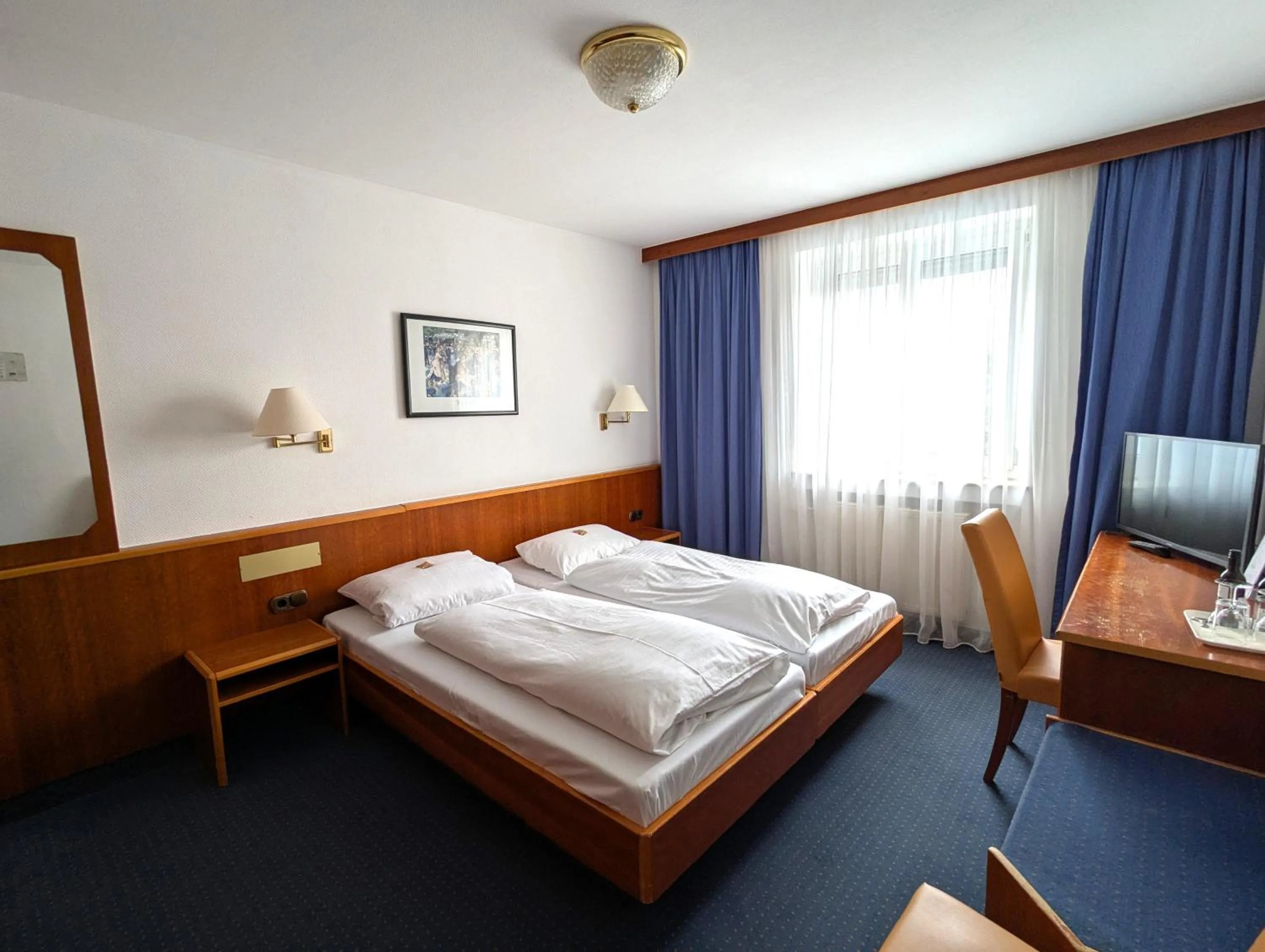 Photo of the whole room, Bed in City Hotel Stuttgart