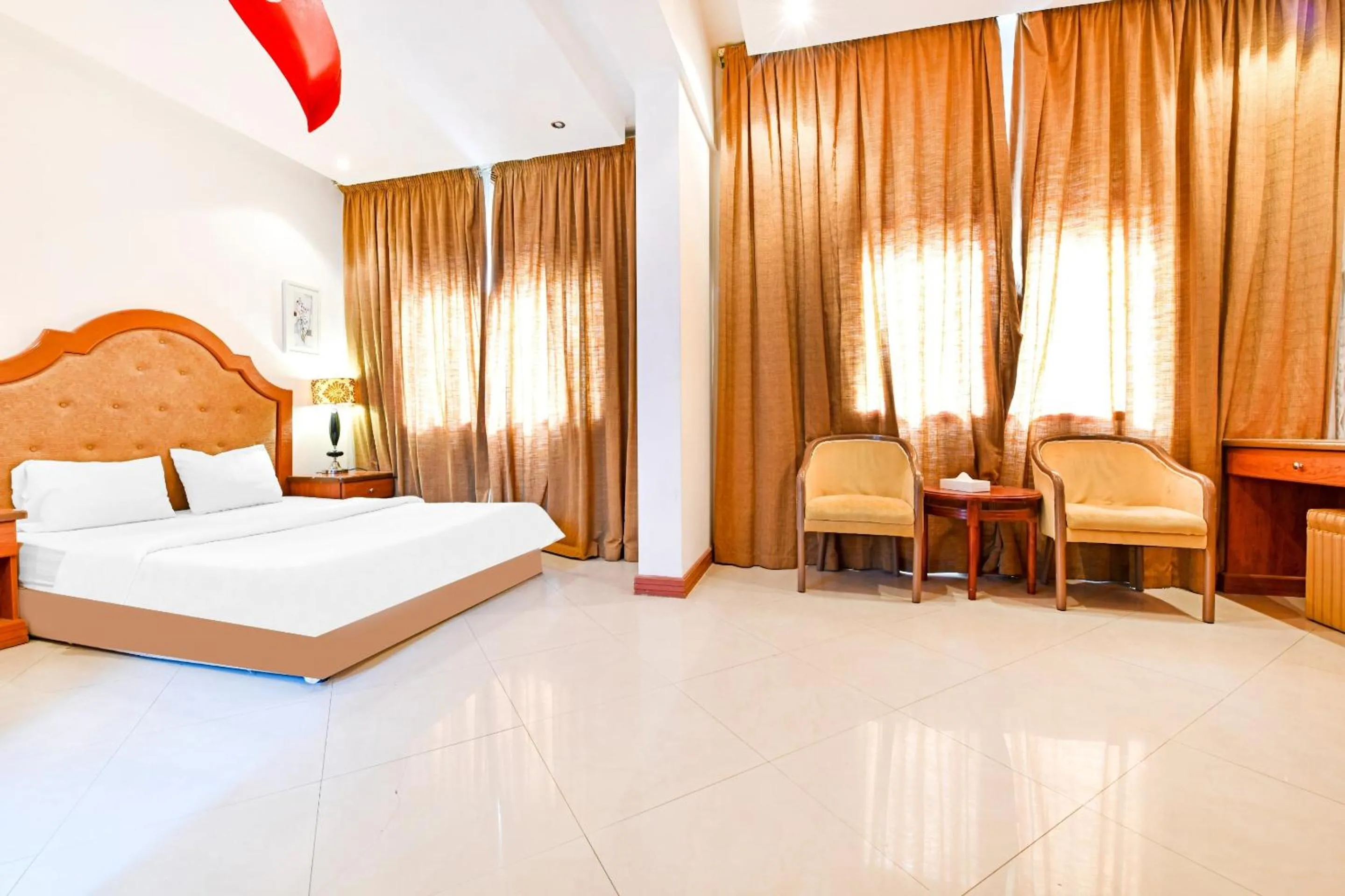 Bedroom, Bed in OYO 118 Revira Hotel