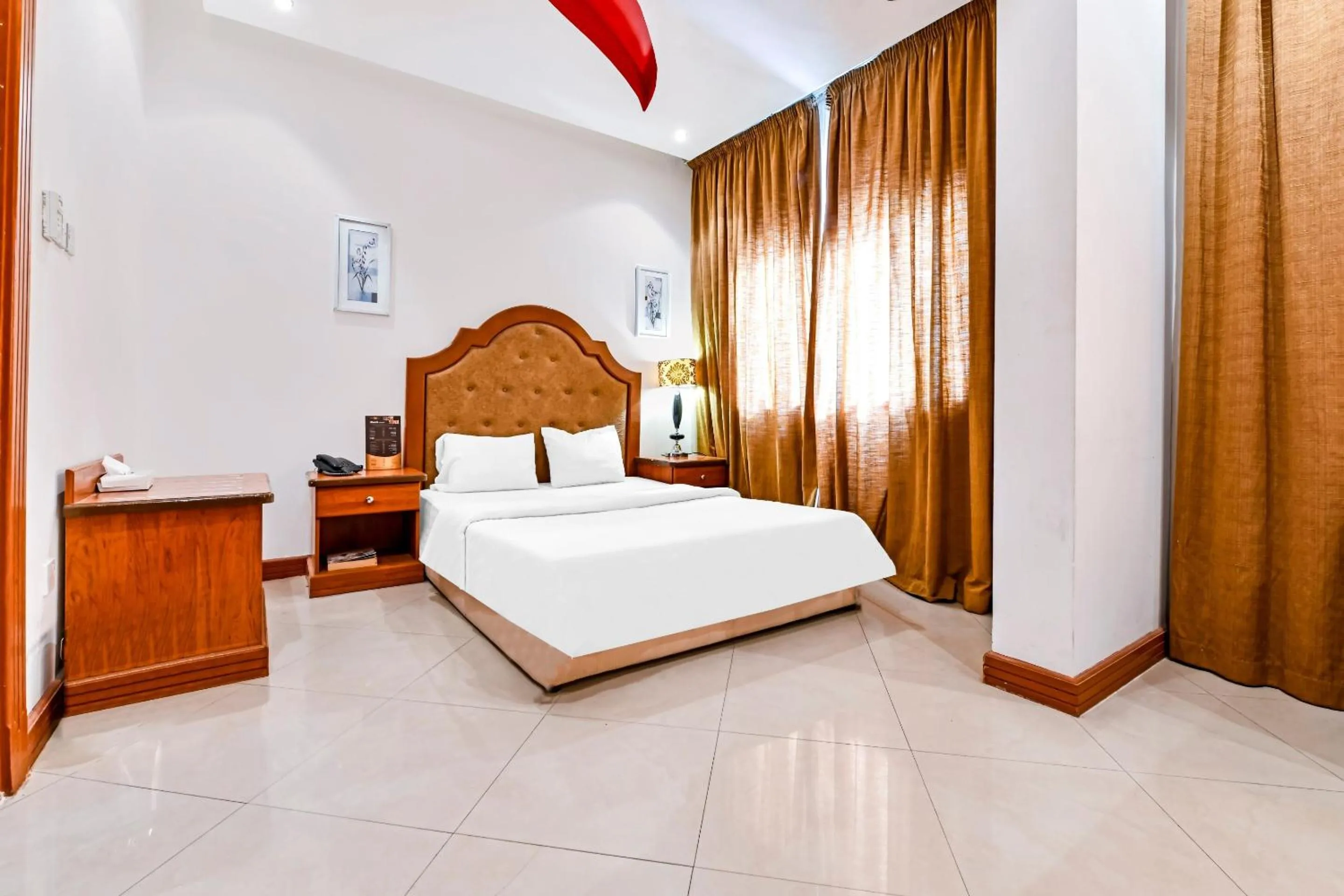 Bedroom, Bed in OYO 118 Revira Hotel