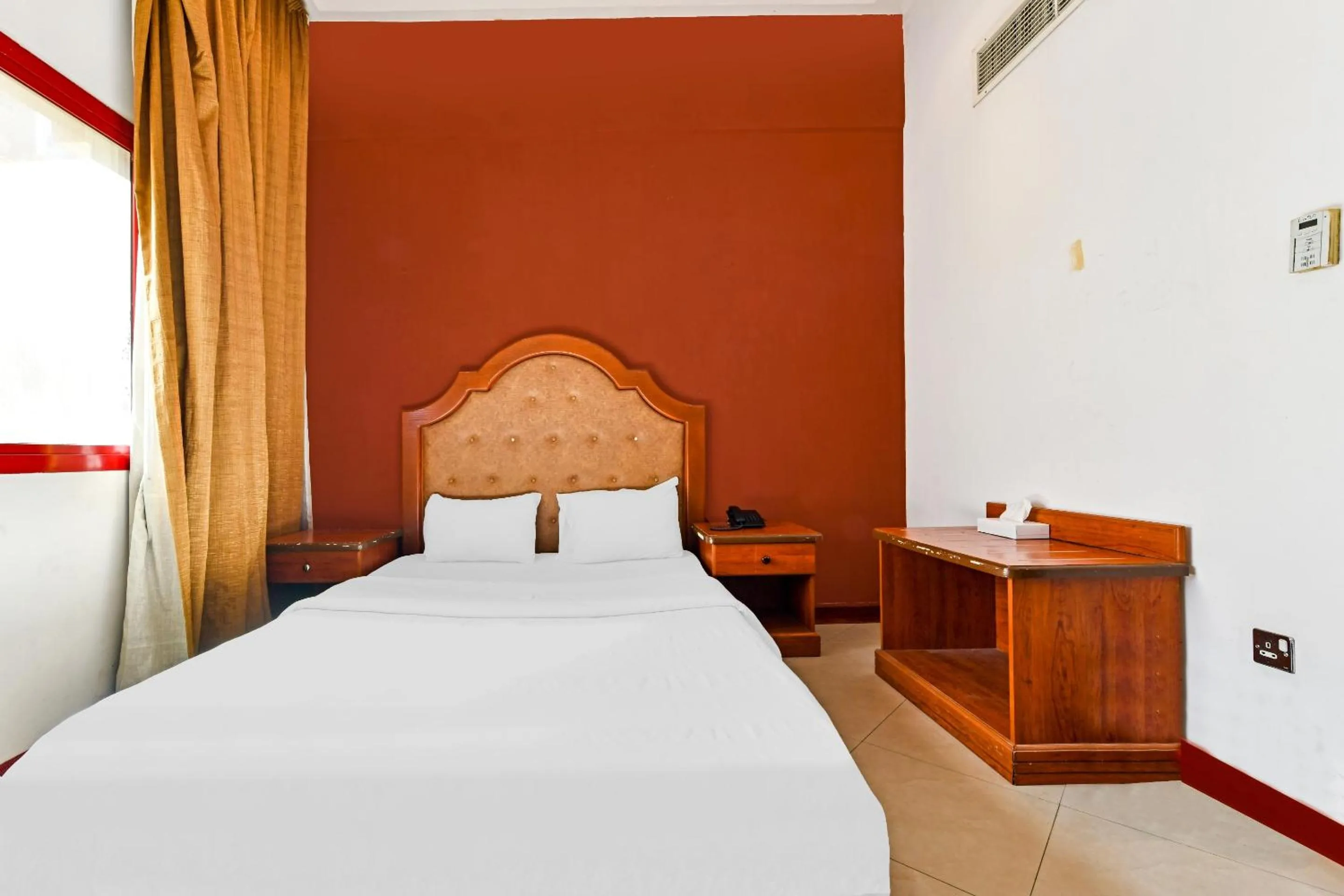 Bedroom, Bed in OYO 118 Revira Hotel