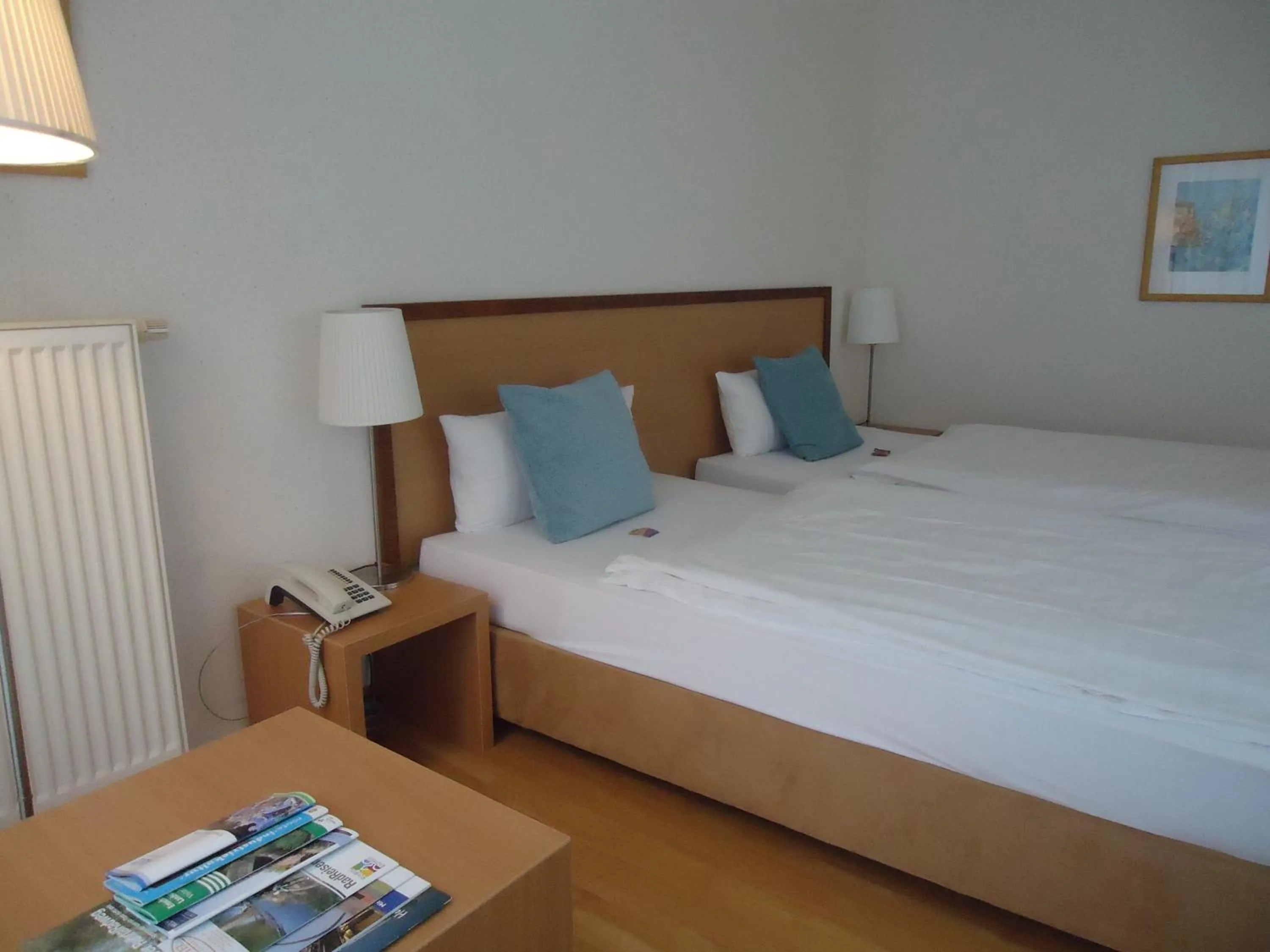 Photo of the whole room, Bed in Thiesmann´s Hotel & Restaurant